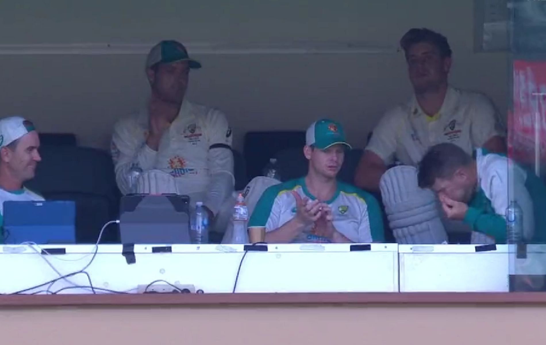David Warner sneezes while chatting with Steve Smith in the pavillion. (PC: 7Cricket)