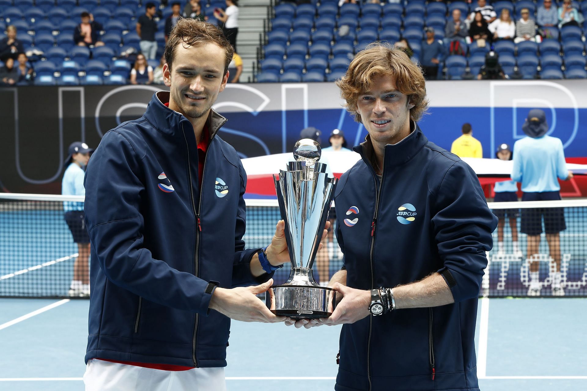 Daniil Medvedev and Andrey Rublev of Russia with the ATP Cup trophy