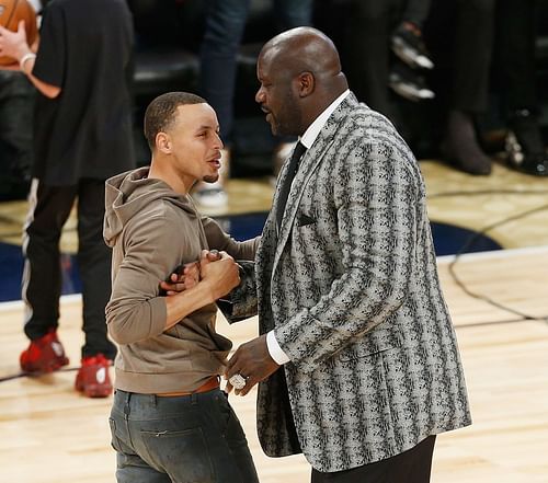 Hall of Famer Shaquille O'Neal with Stephen Curry of the Golden State Warriors