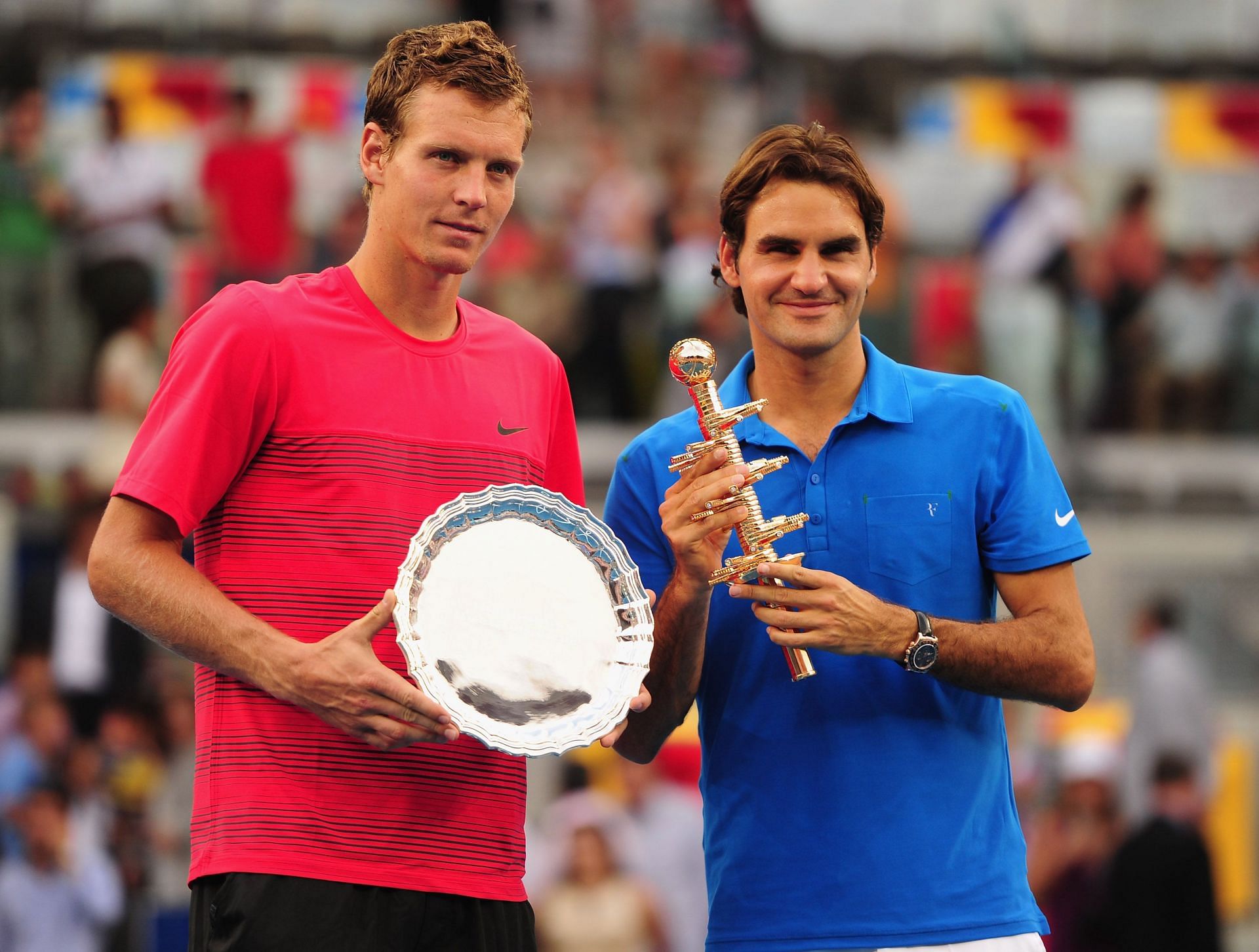 Tomas Berdych (L) & Roger Federer with their trophies