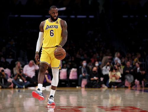 LeBron James of the LA Lakers reacts as he waits to play the last shot of the third quarter during a 117-102 win over the Boston Celtics on Dec. 7, 2021, in Los Angeles, California.