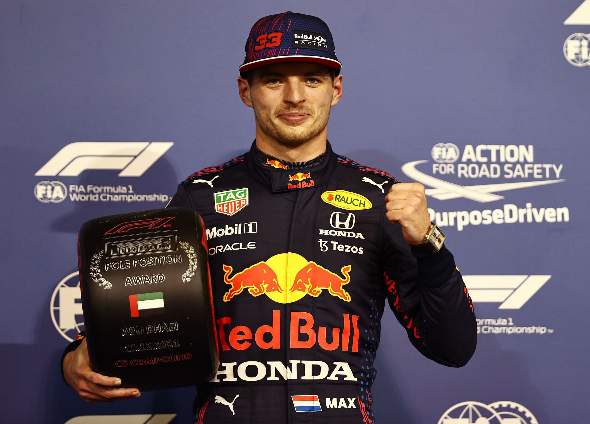 Pole position qualifier Max Verstappen celebrates in parc ferme during qualifying ahead of the 2021 Abu Dhabi Grand Prix.