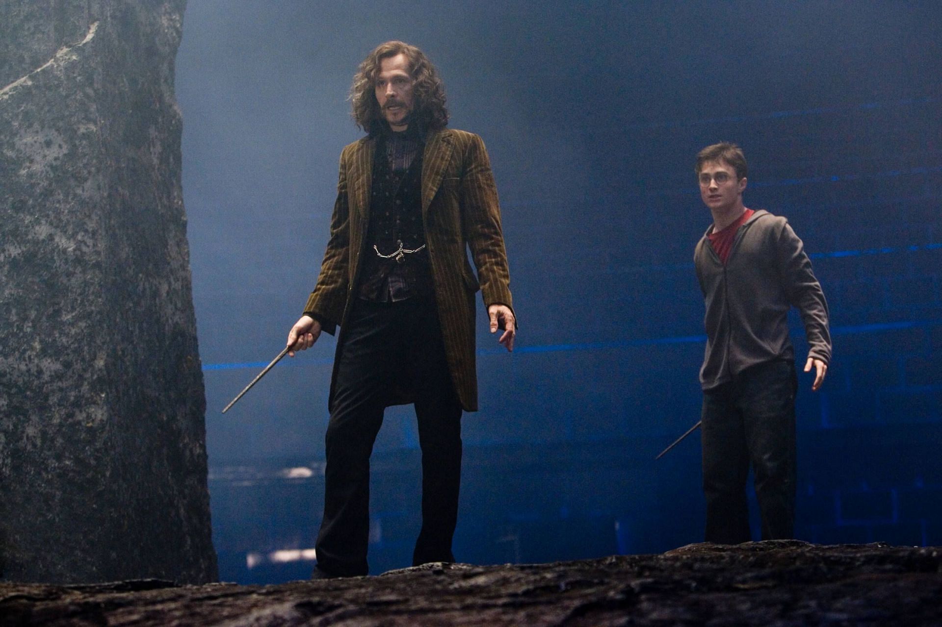 Sirius Black and Harry Potter preparing for battle (Image via Warner Bros.)