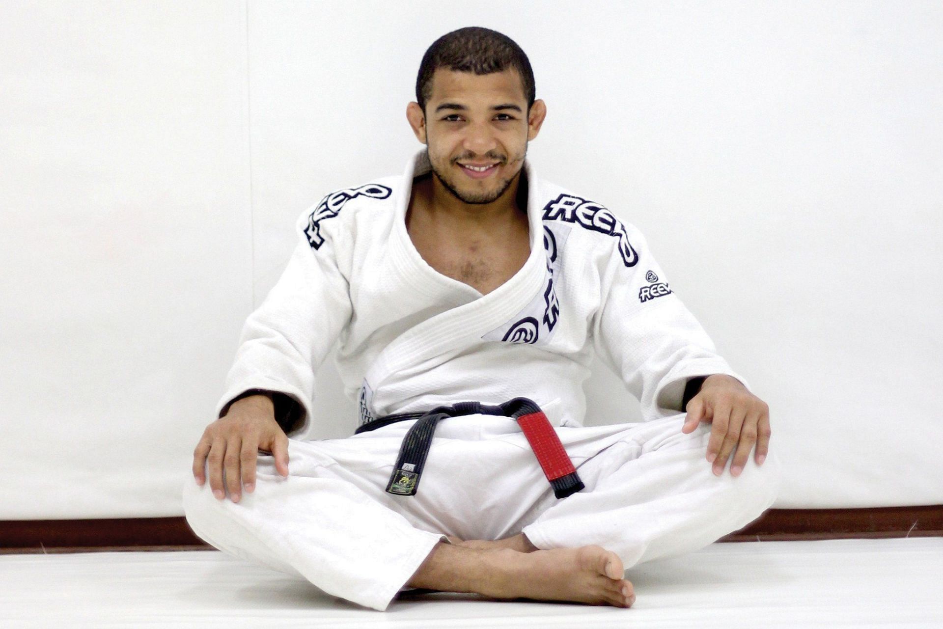Jose Aldo poses in a jiu-jitsu gi