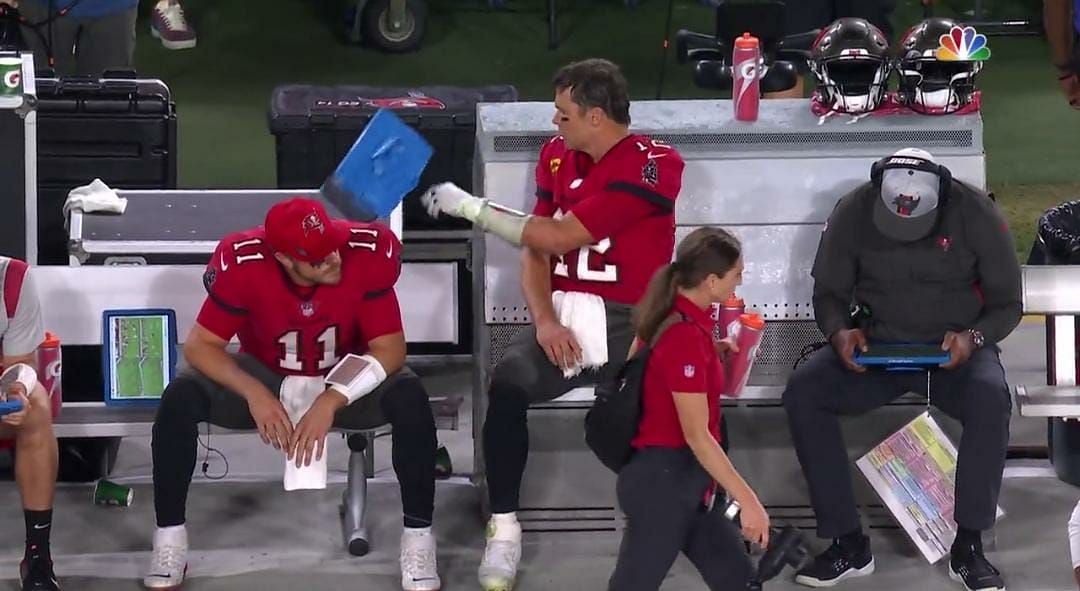 Buccaneers QB Tom Brady throws his tablet during Sunday night&#039;s game at Raymond James Stadium.