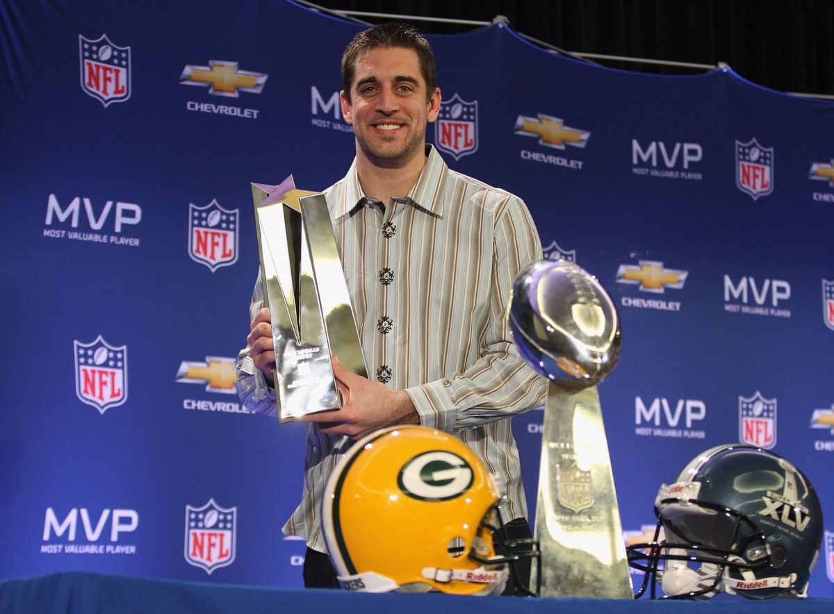 What is Aaron Rodgers' playoff record?
