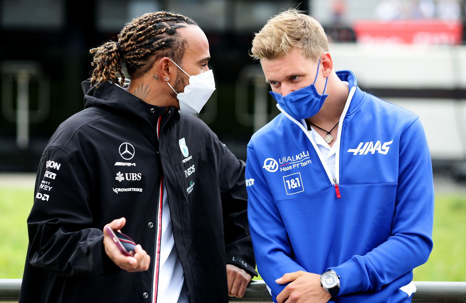 Lewis Hamilton (left) in conversation with Mick Schumacher (right) (Photo by Peter Fox/Getty Images)