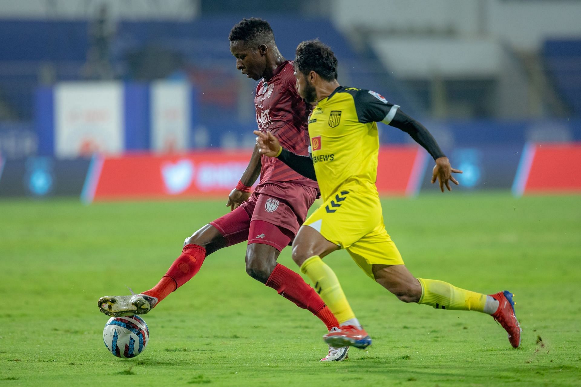 Hyderabad FC&#039;s Aniket Jadhav and NorthEast United&#039;s Zakaria Diallo go for the ball. [Credits: ISL]