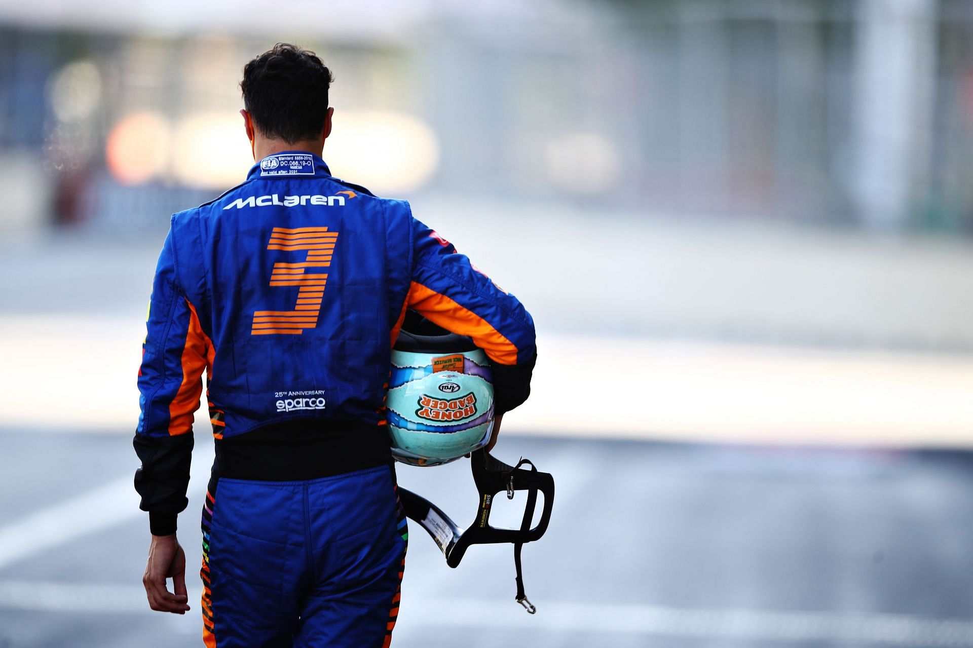 Daniel Ricciardo walks away from his car after a crash in qualifying, ahead of the 2021 Azerbaijan Grand Prix