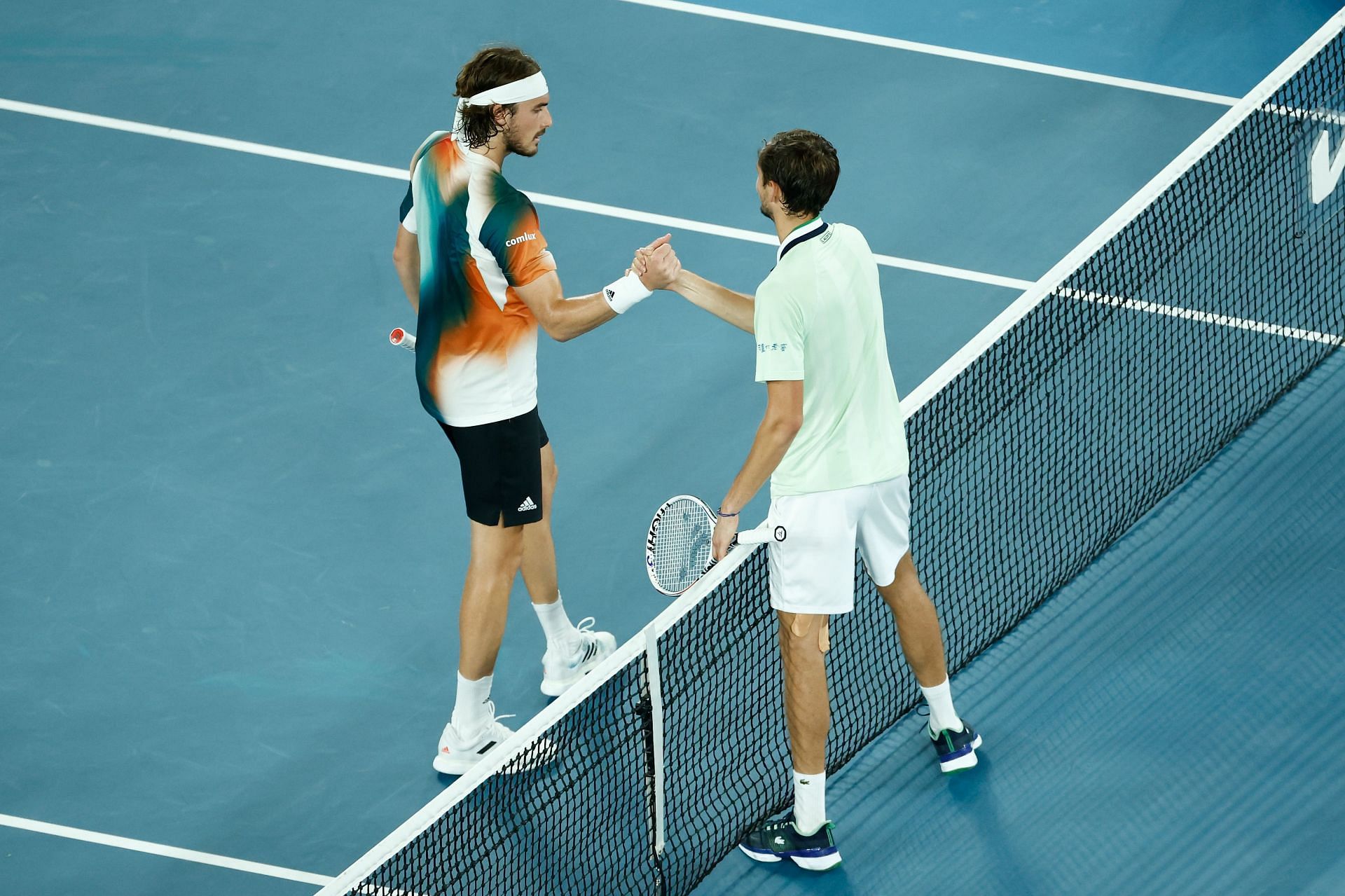 Medevdev and Stefanos Tsitispas at the 2022 Australian Open.