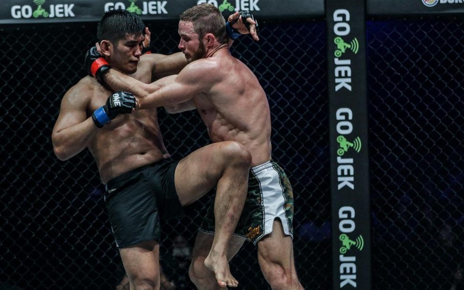 Will we finally see Aung La NSang (Left) and Vitaly Bigdash (Right) settle the score in 2022? | [Photo: ONE Championship]