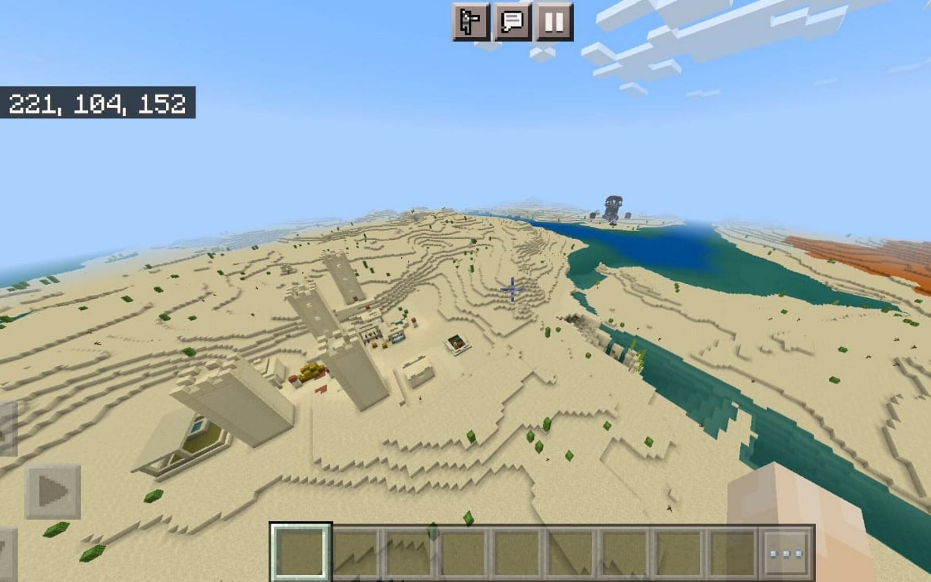 Un pueblo con un puesto de avanzada y un barranco cercano (Imagen a través de Minecraft)