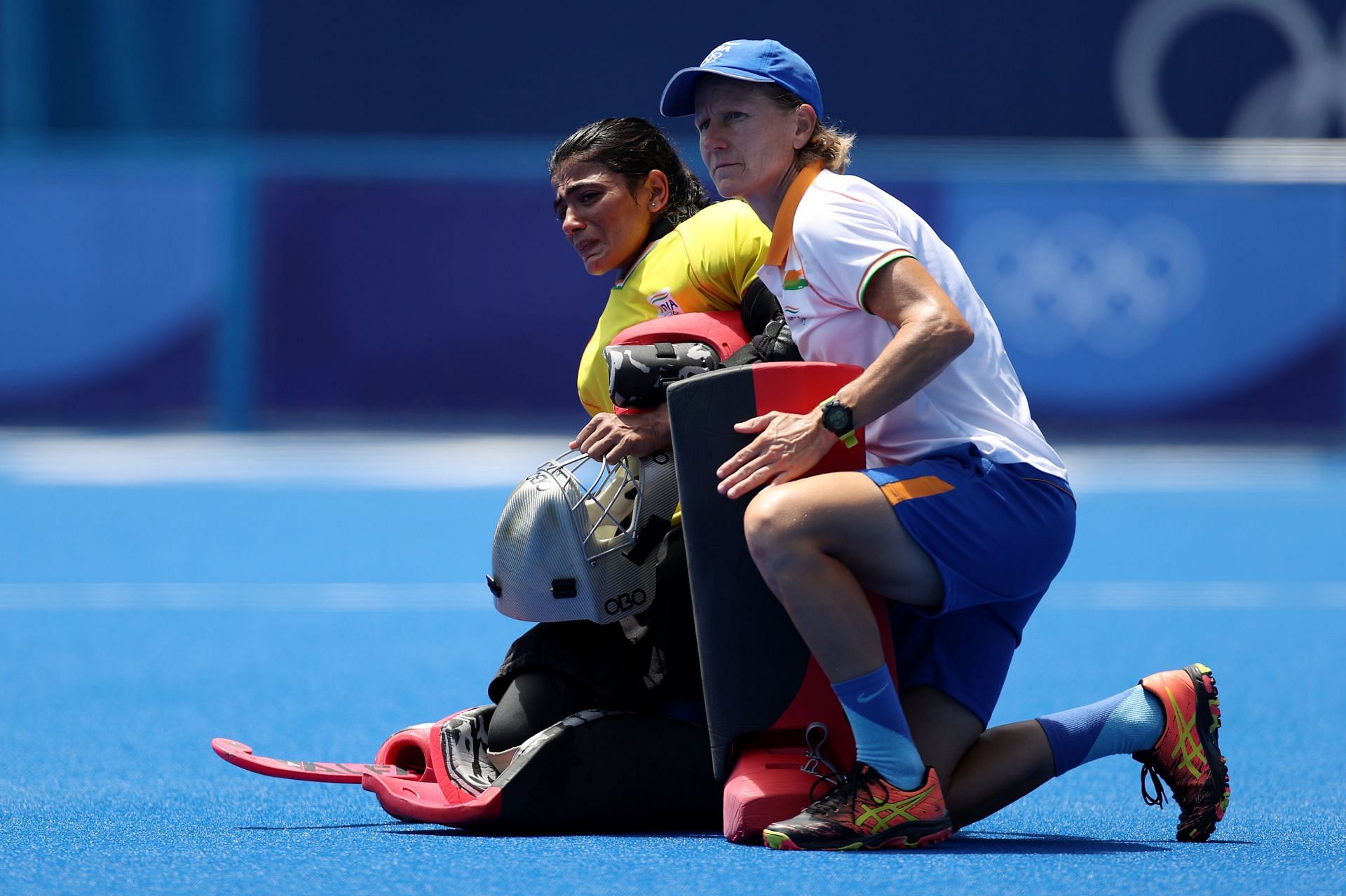 Indian goalkeeper Savita Punia (L) and chief coach Janneke Schopman in Tokyo