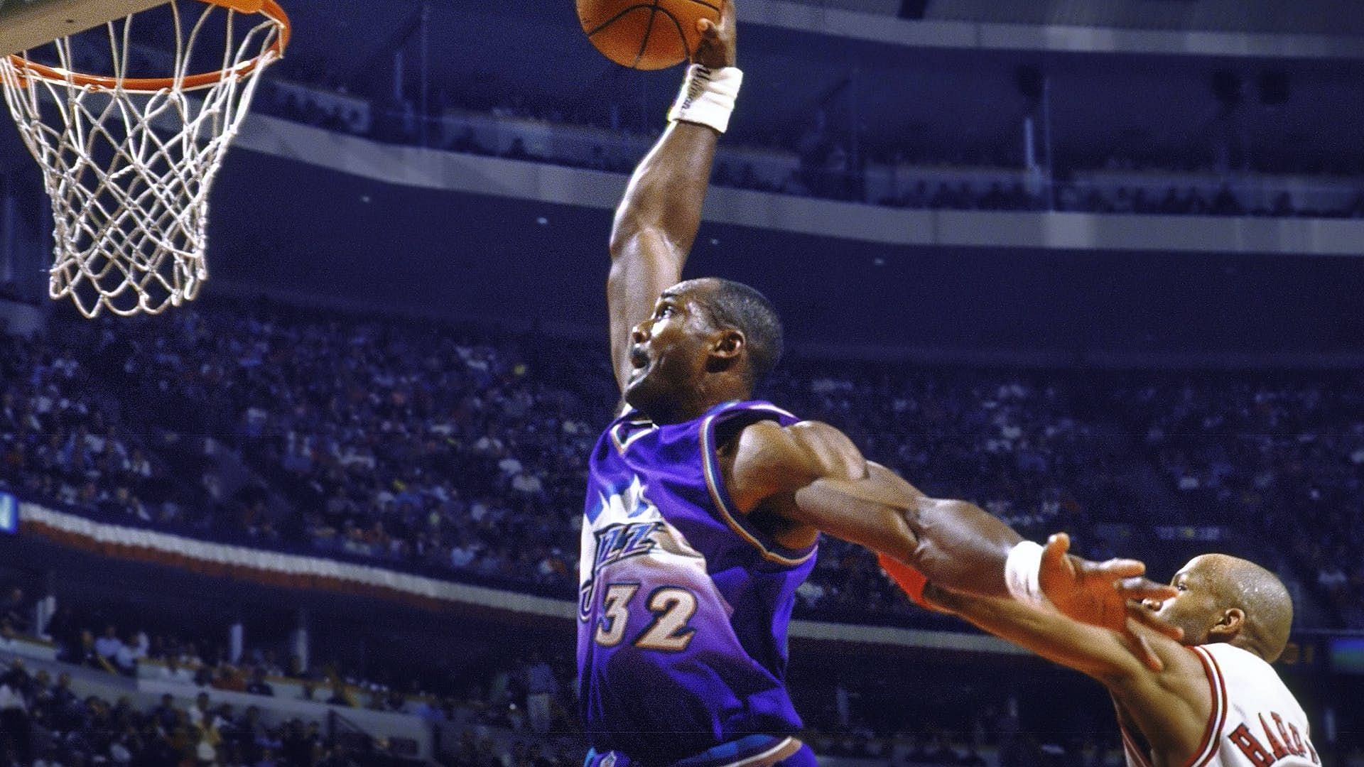 Karl Malone dunking the ball during his days with the Utah Jazz.