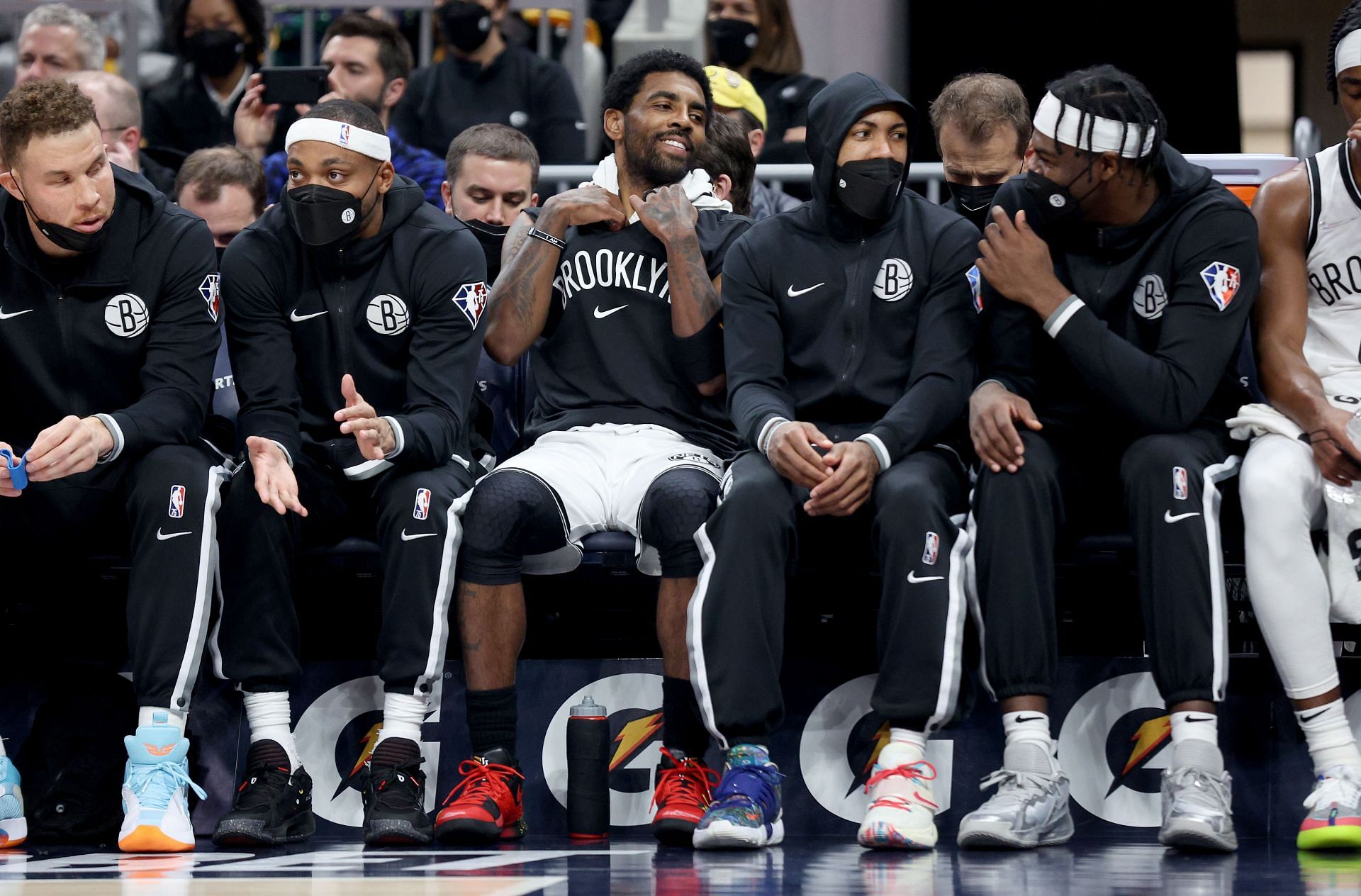 Kyrie Irving (middle) of the Brooklyn Nets on the bench