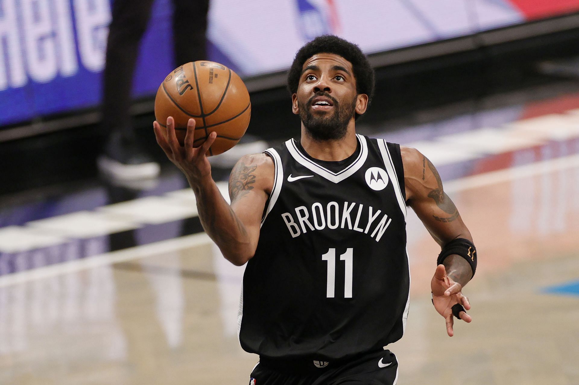Brooklyn Nets All-Star Kyrie Irving going up for a layup
