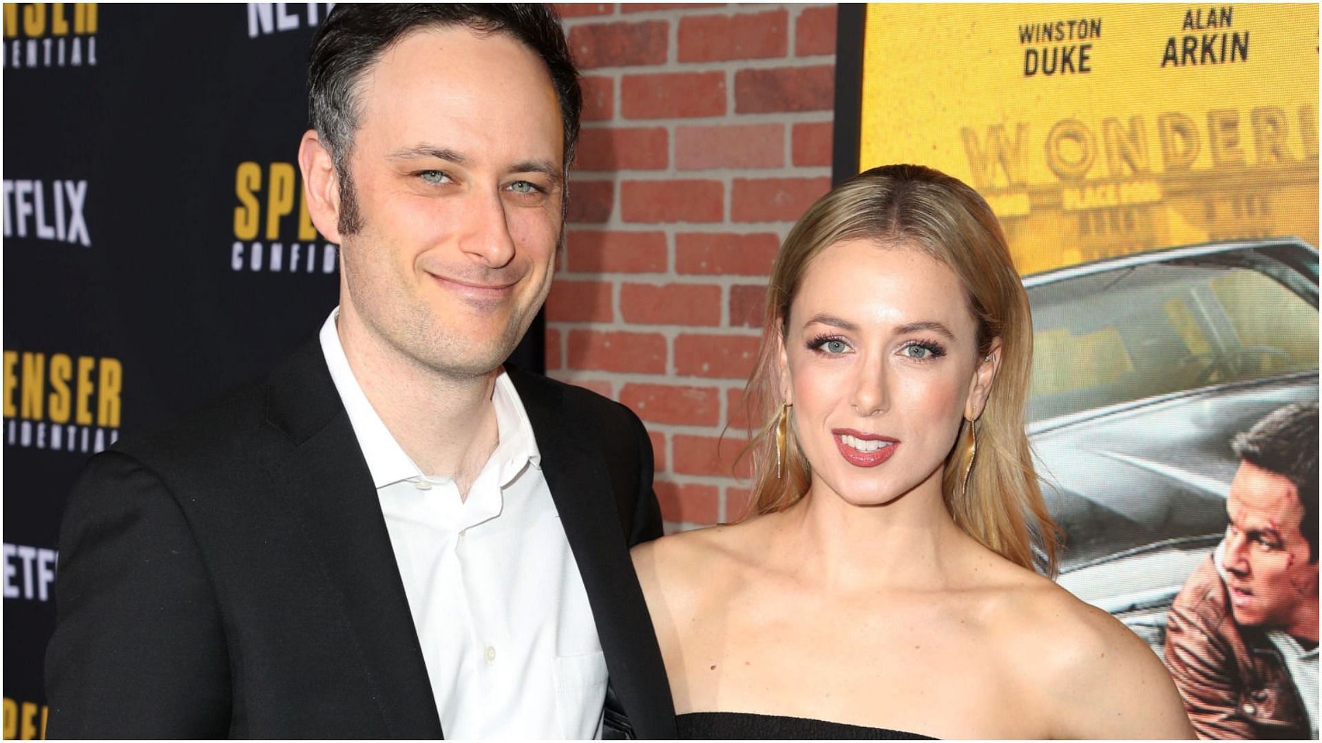 Noah Galuten and Iliza Shlesinger attend the Netflix Premiere Spenser Confidential at Westwood Village Theatre (Image via Weiss Eubanks/Getty Images)