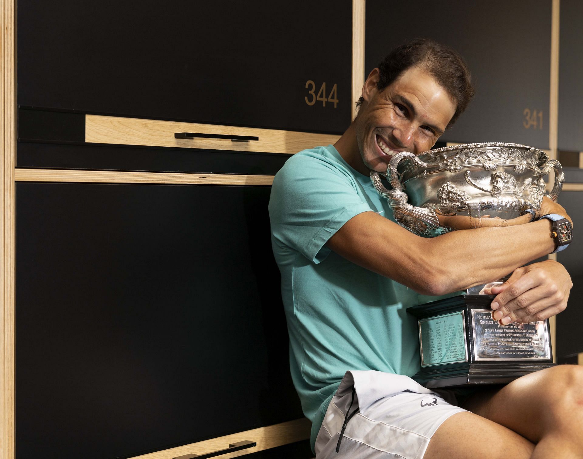 Rafael Nadal with the 2022 Australian Open trophy: Day 14
