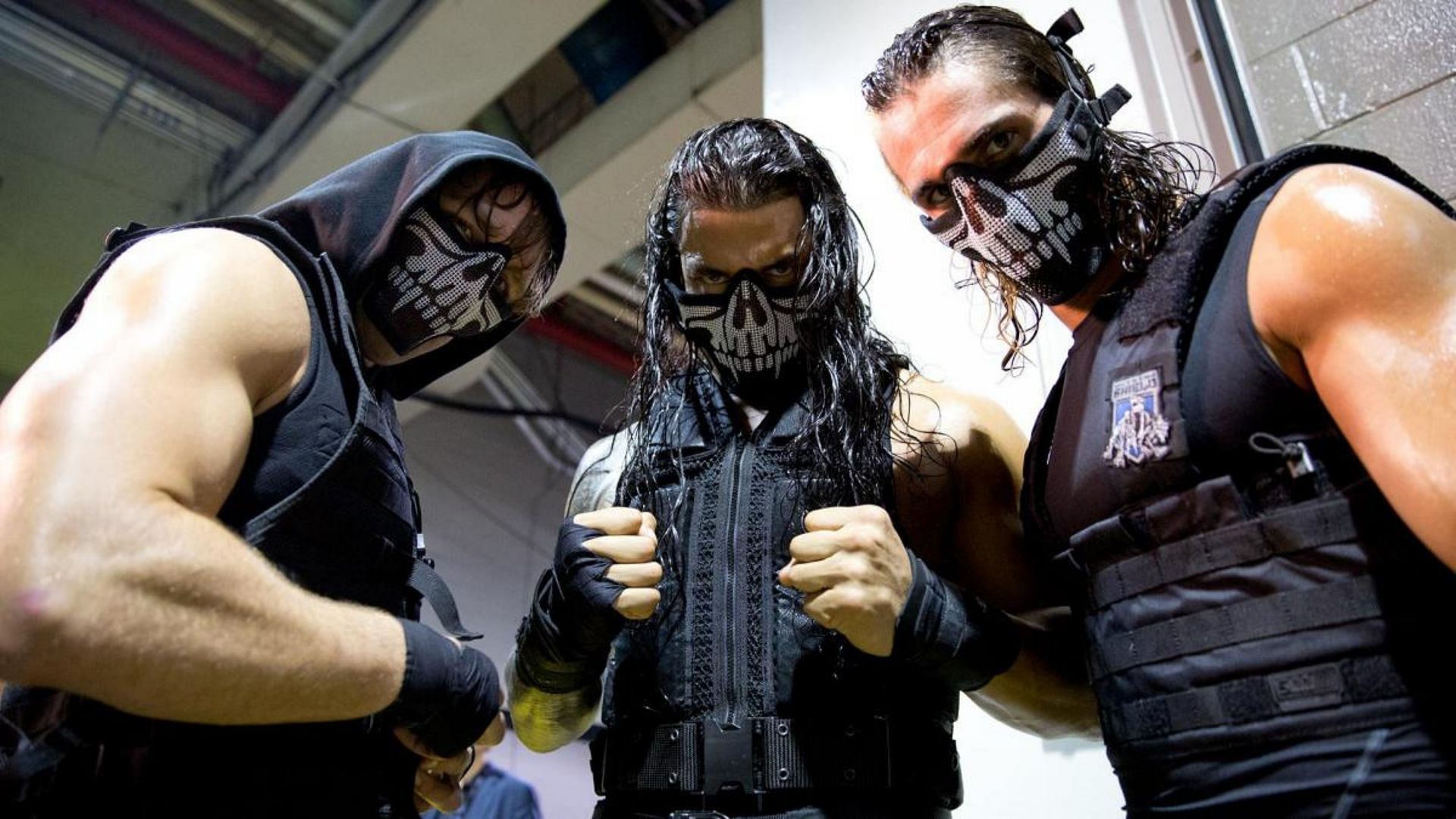 Jon Moxley, Roman Reigns, and Seth Rollins