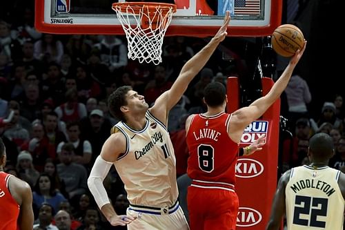 Brook Lopez of the Milwaukee Bucks tries to block Chicago Bulls' Zach LaVine