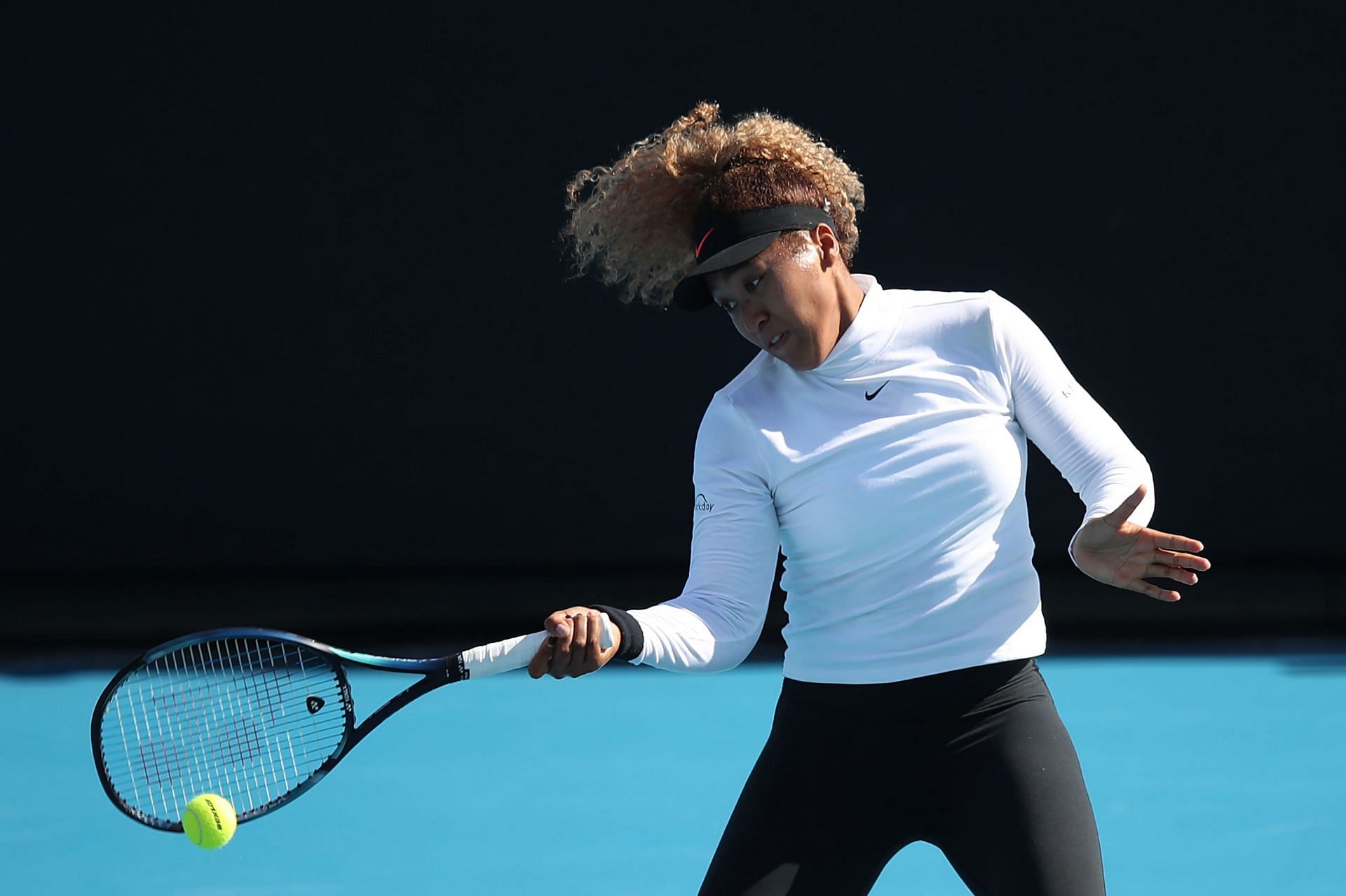 Naomi Osaka hits a forehand during her practice session