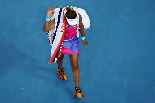 Naomi Osaka exits the arena after losing to Amanda Anisimova in the third of Australian Open 2022