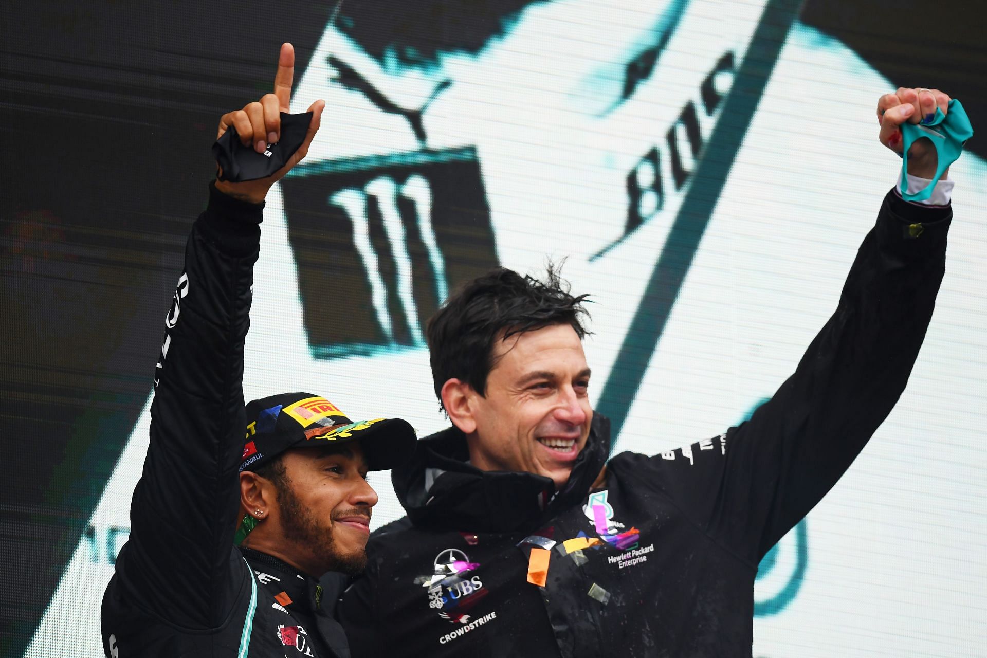 Lewis Hamilton and Toto Wolff on the podium at the 2020 Turkish GP (Photo by Clive Mason/Getty Images)