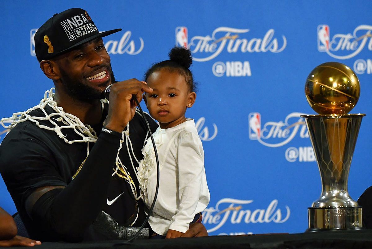 James with his daughter Zhuri after winning the 2016 NBA Finals [Image Credits: John W. McDonough/Sports Illustrated]