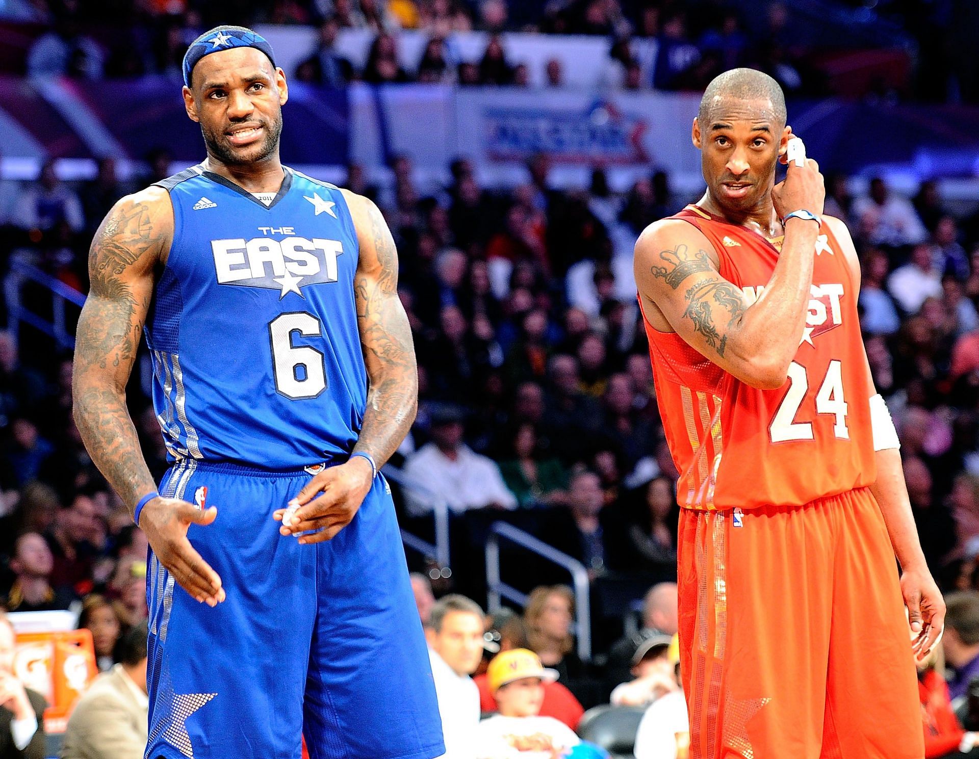 LeBron James (6) of the Miami Heat and the Eastern Conference stands with Kobe Bryant (24) of the LA Lakers and the Western Conference in the 2011 All-Star Game at Staples Center on Feb. 20, 2011 in Los Angeles, California.