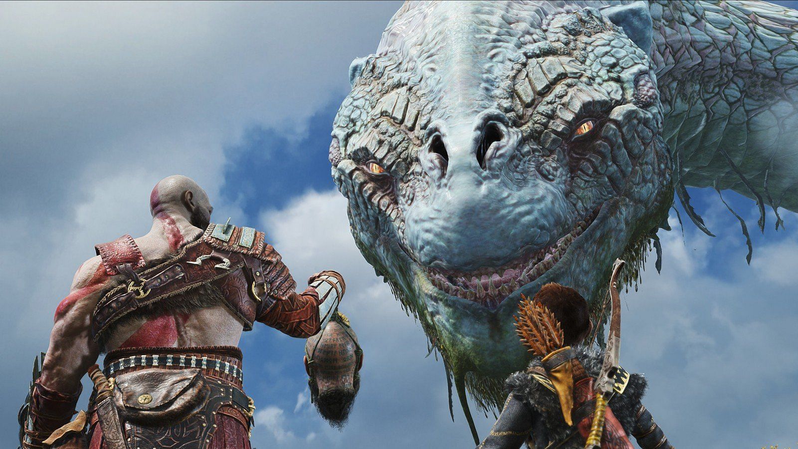 Kratos showing Mimir&#039;s head to the world serpent (Image via Sony)