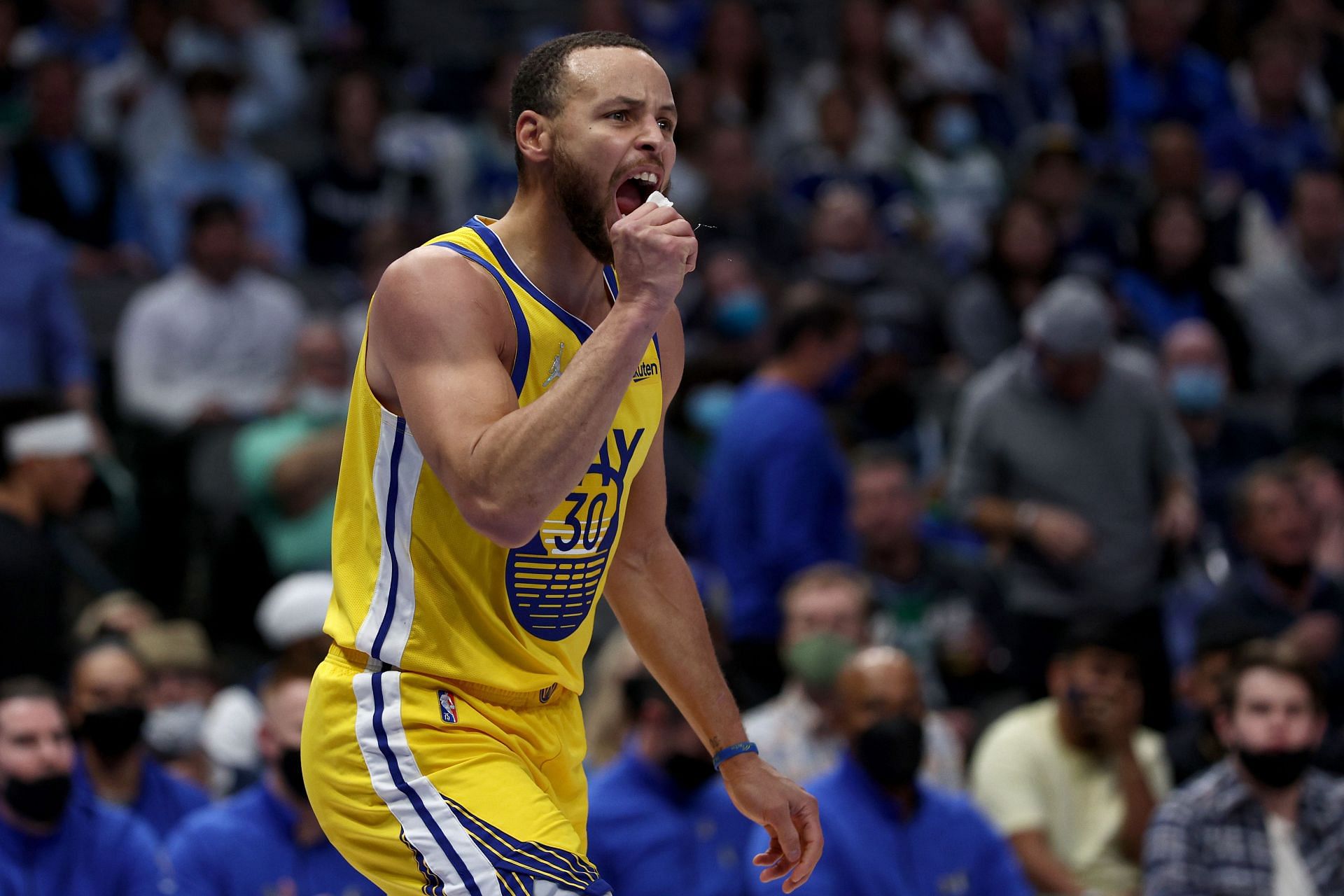 Steph Curry #30 of the Golden State Warriors reacts after being fouled by Luka Doncic #77 of the Dallas Mavericks