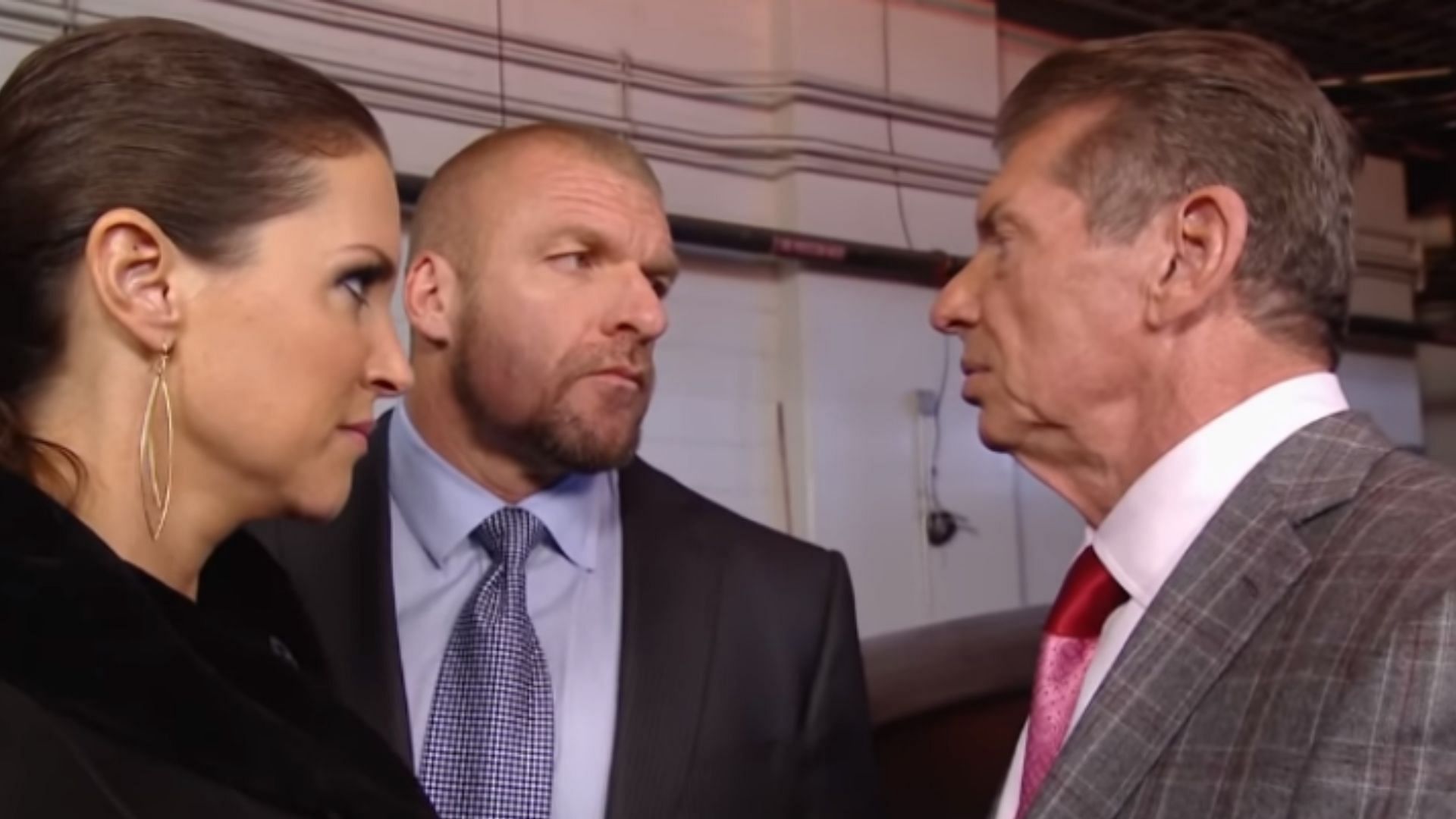 Stephanie McMahon, Triple H, and Vince McMahon