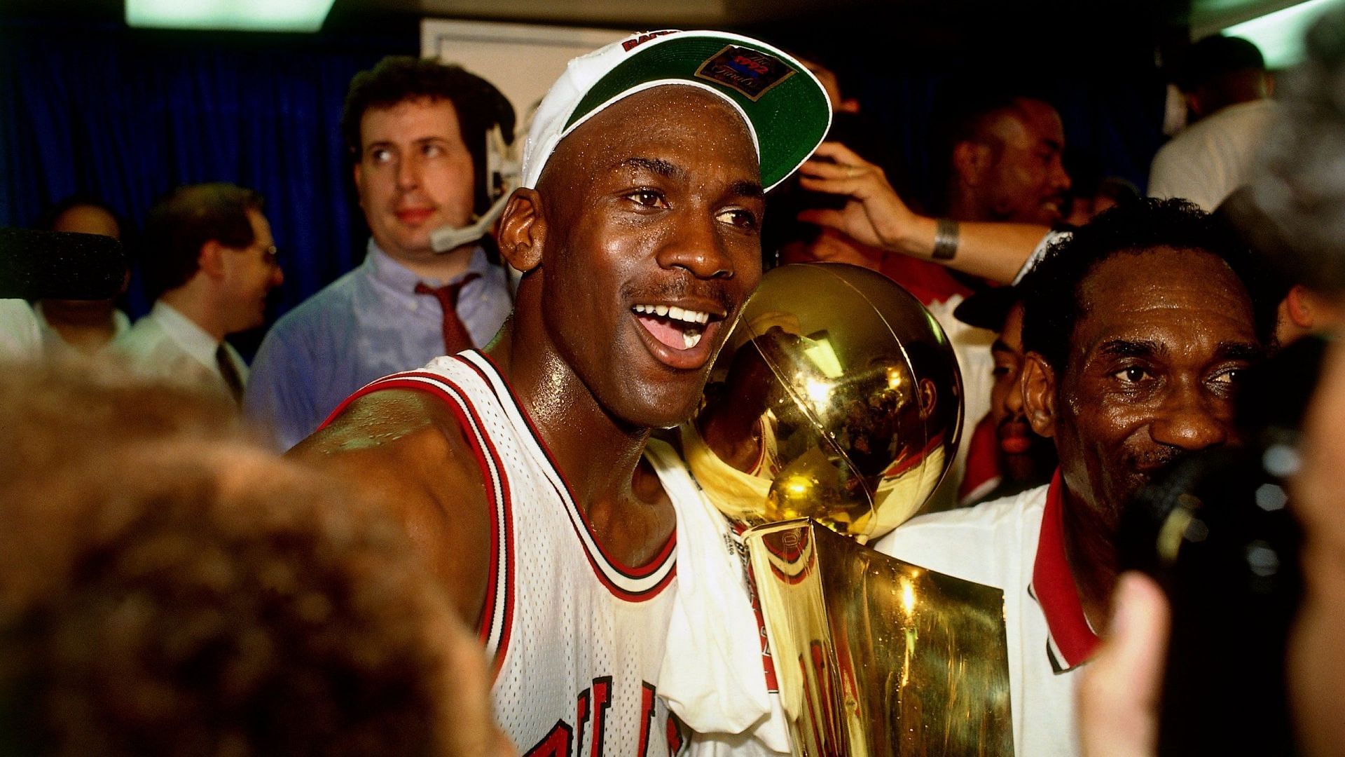 Michael Jordan with the Larry O&#039;Brien Trophy.