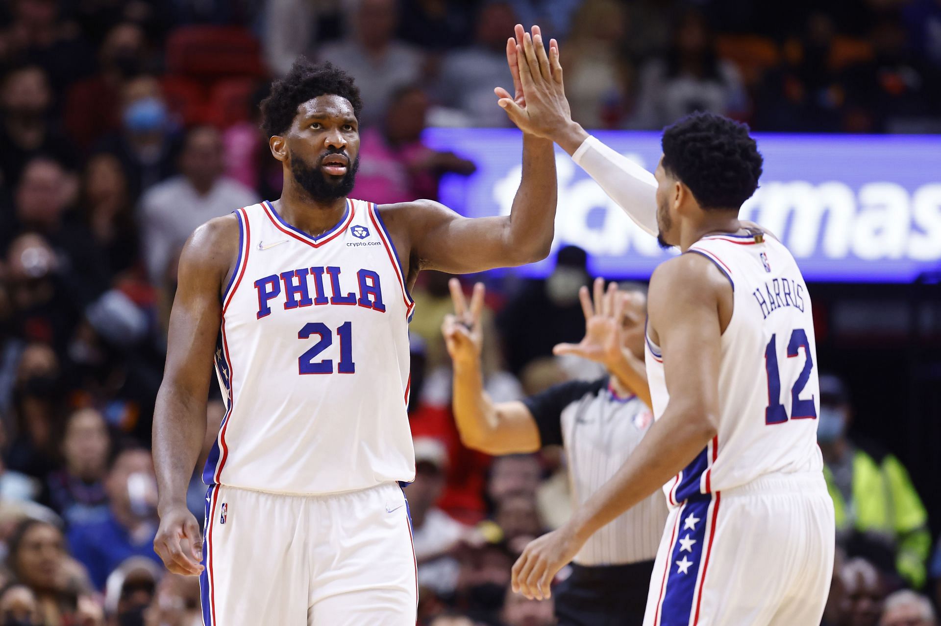 Joel Embiid and Tobias Harris celebrate a play