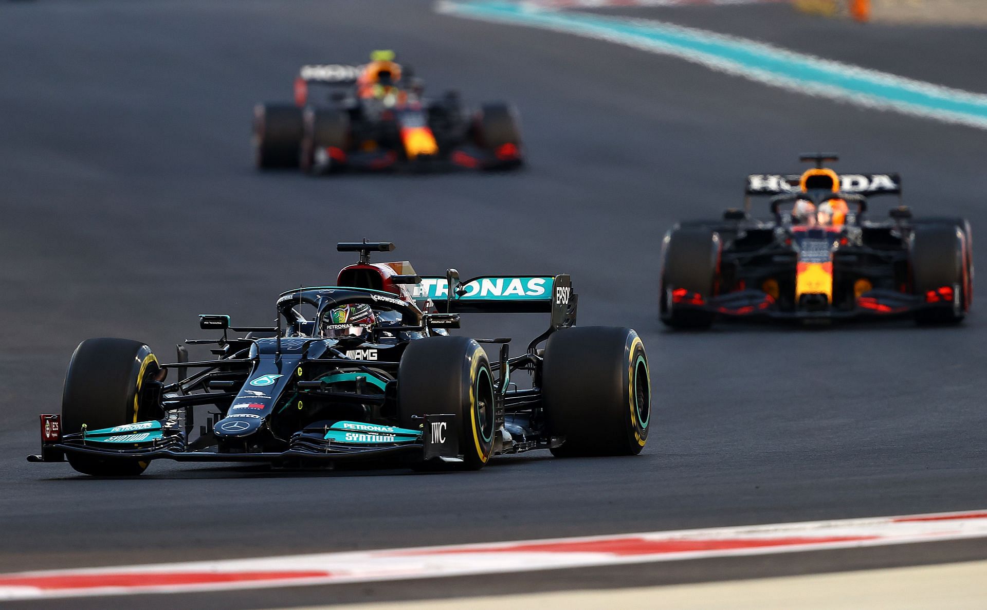 Lewis Hamilton (front) in action at the 2021 Abu Dhabi Grand Prix (Photo by Bryn Lennon/Getty Images)