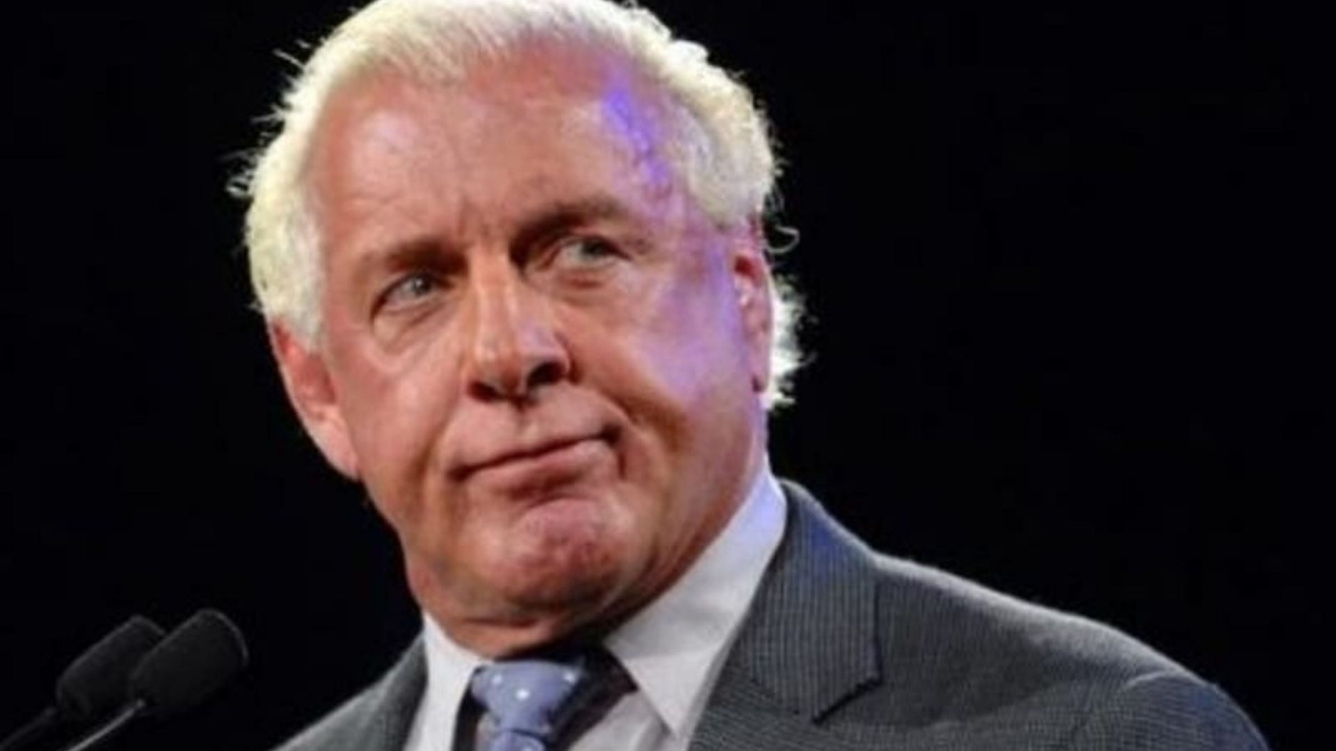 Ric Flair on the microphone at a media event