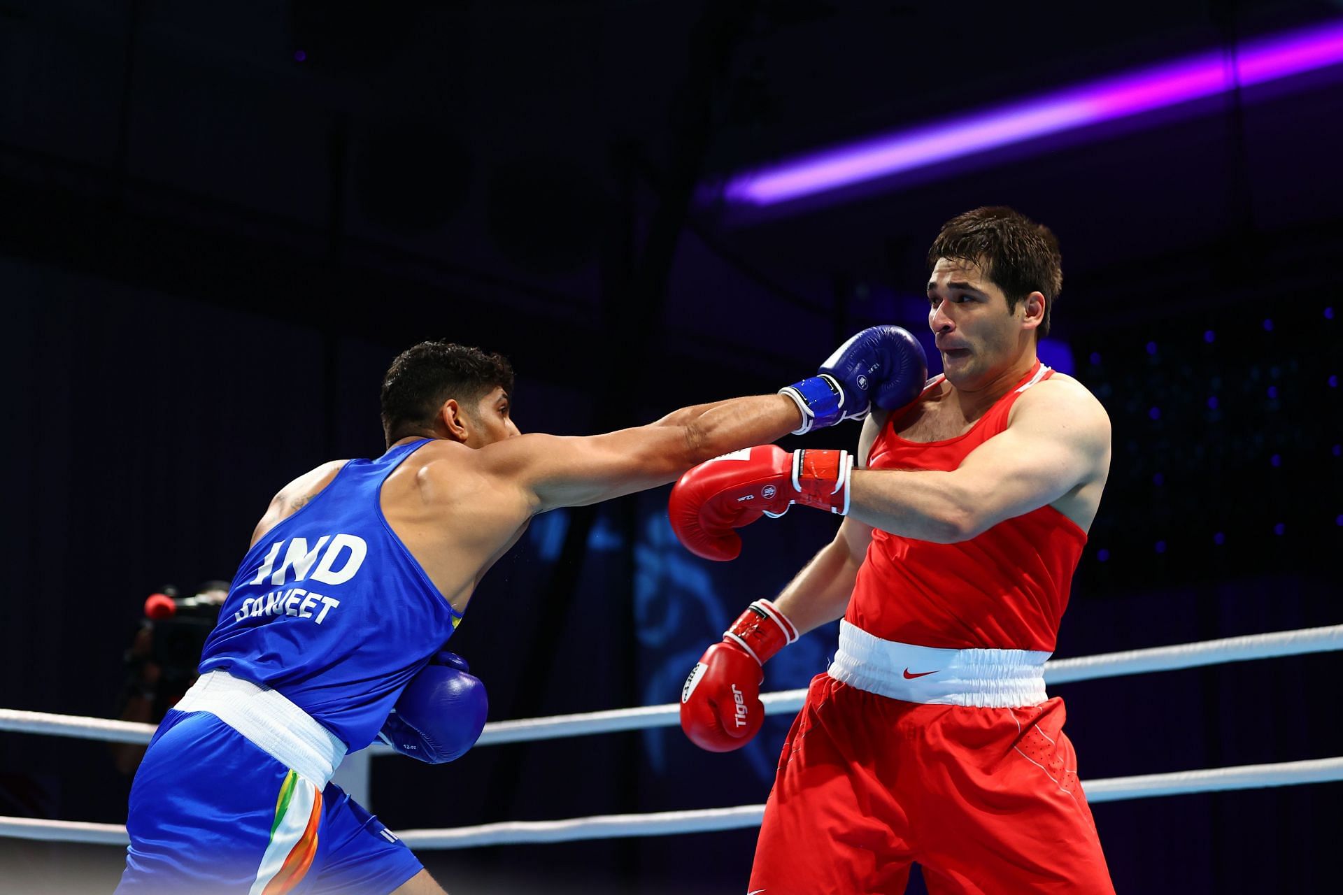 Indian boxer Sanjeet (L) in action at Asian Boxing Championships