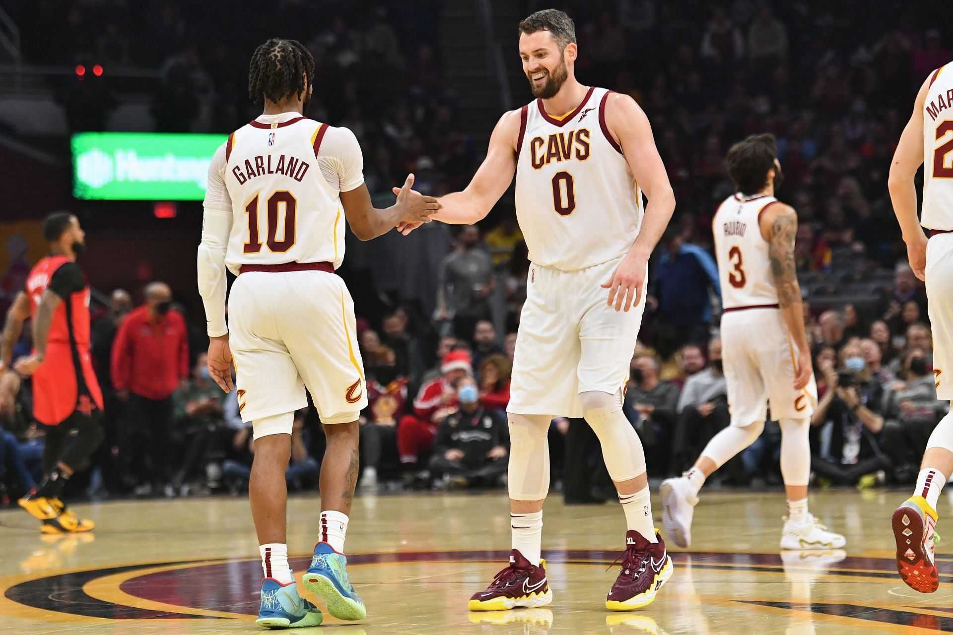 Darius Garland and Kevin Love of the Cleveland Cavaliers
