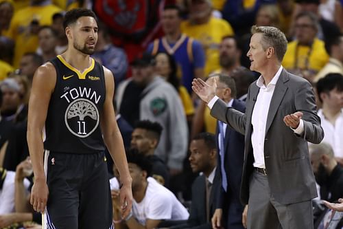 Klay Thompson and Steve Kerr during an NBA game