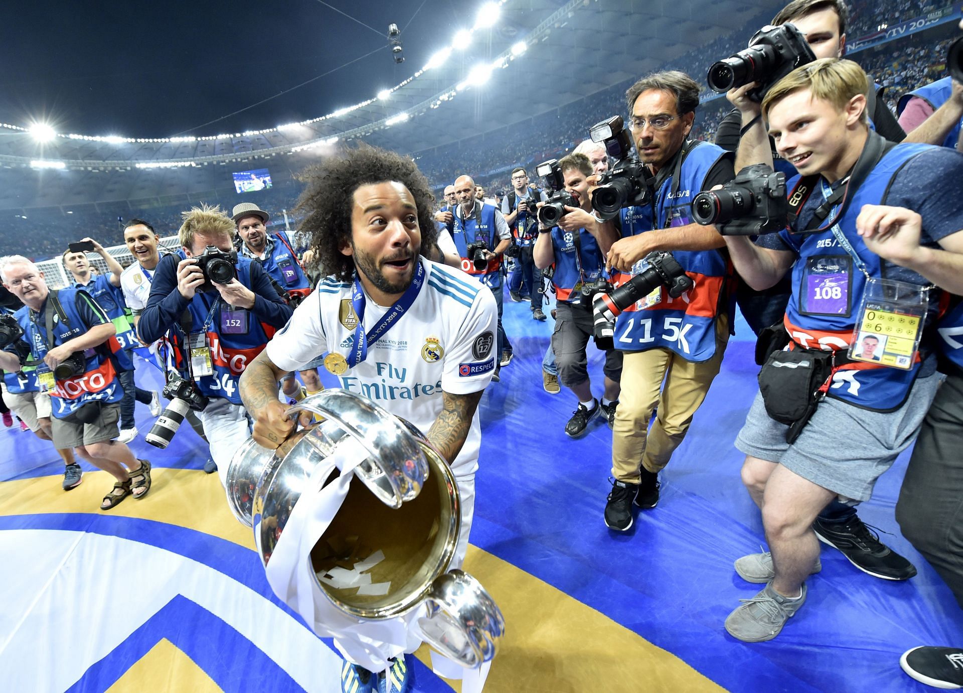 Marcelo celebrates with the UEFA Champions League trophy