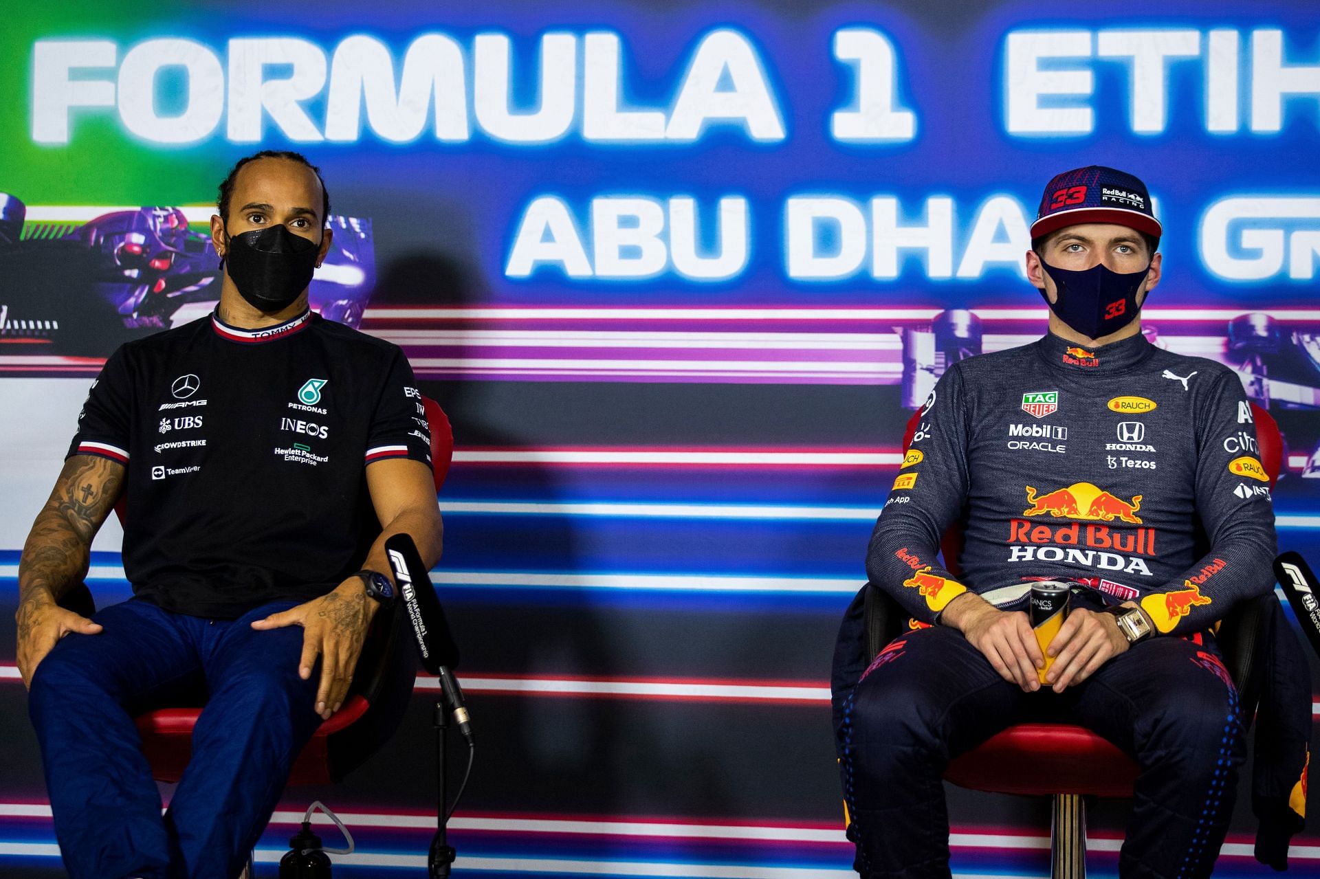 Max Verstappen oand Lewis Hamilton talk in the press conference ahead of the season finale. (Photo by Sam Bloxham - Pool/Getty Images)