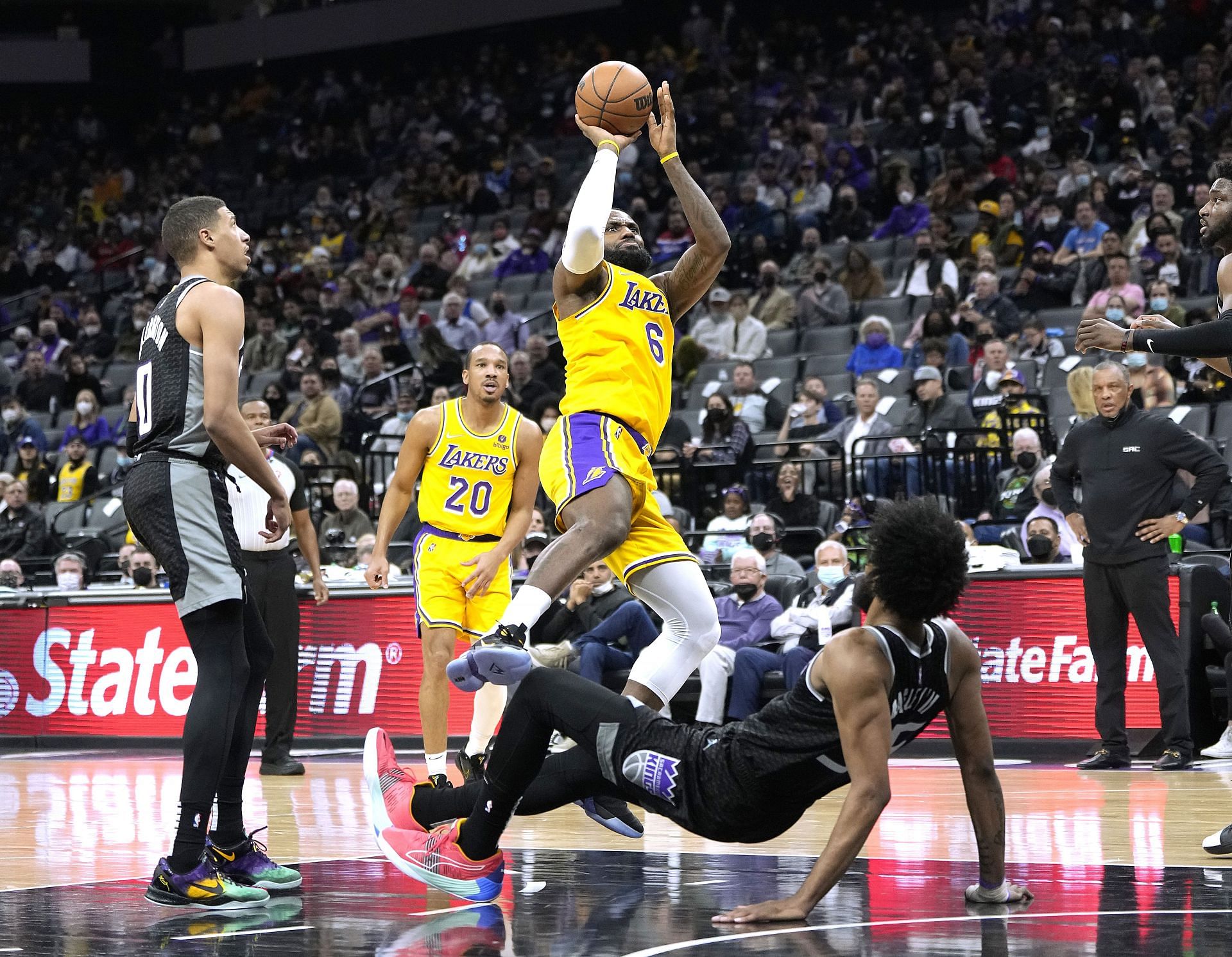 LA Lakers forward LeBron James shoots and draws a foul.