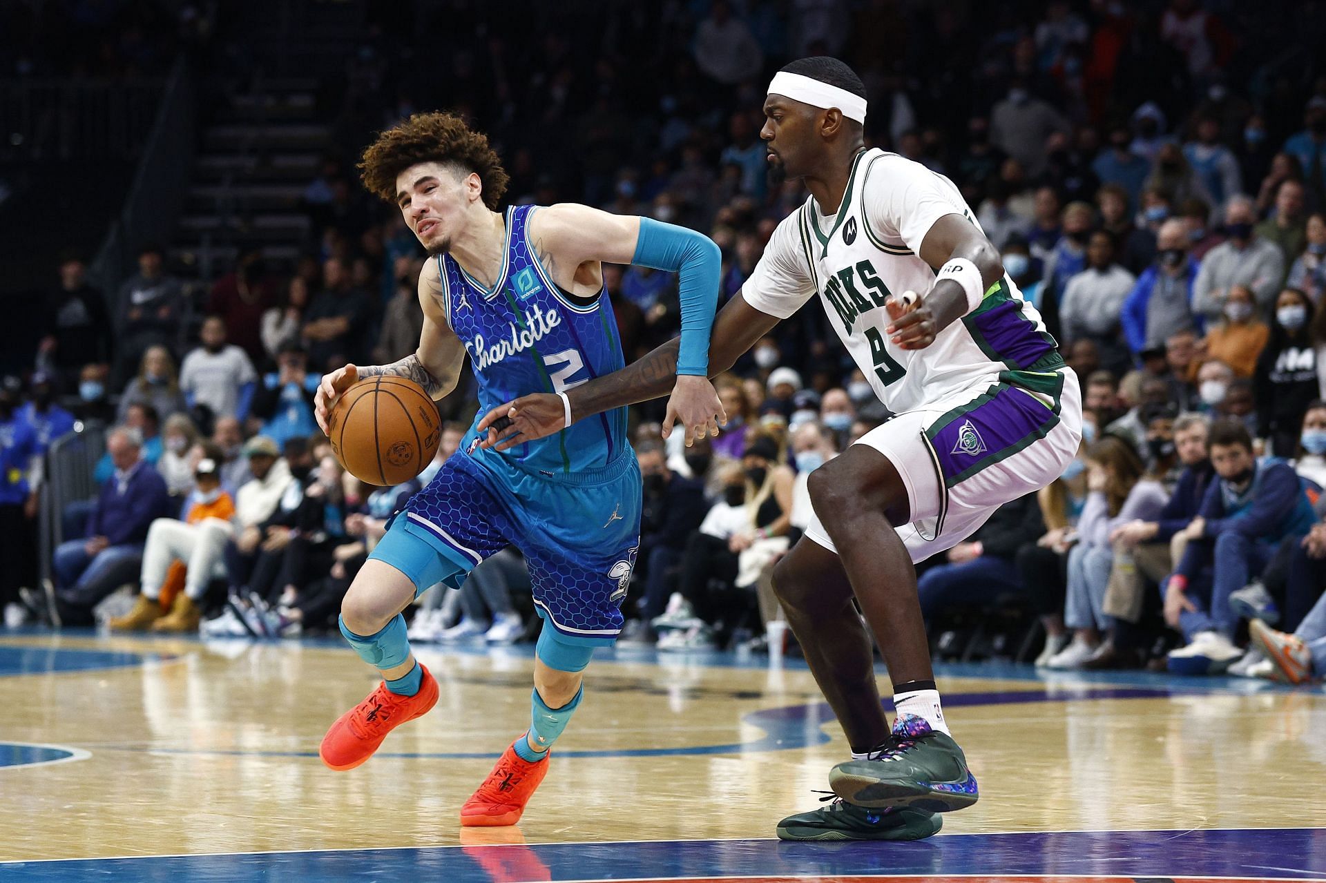 LaMelo Ball attempts to drive past a defender