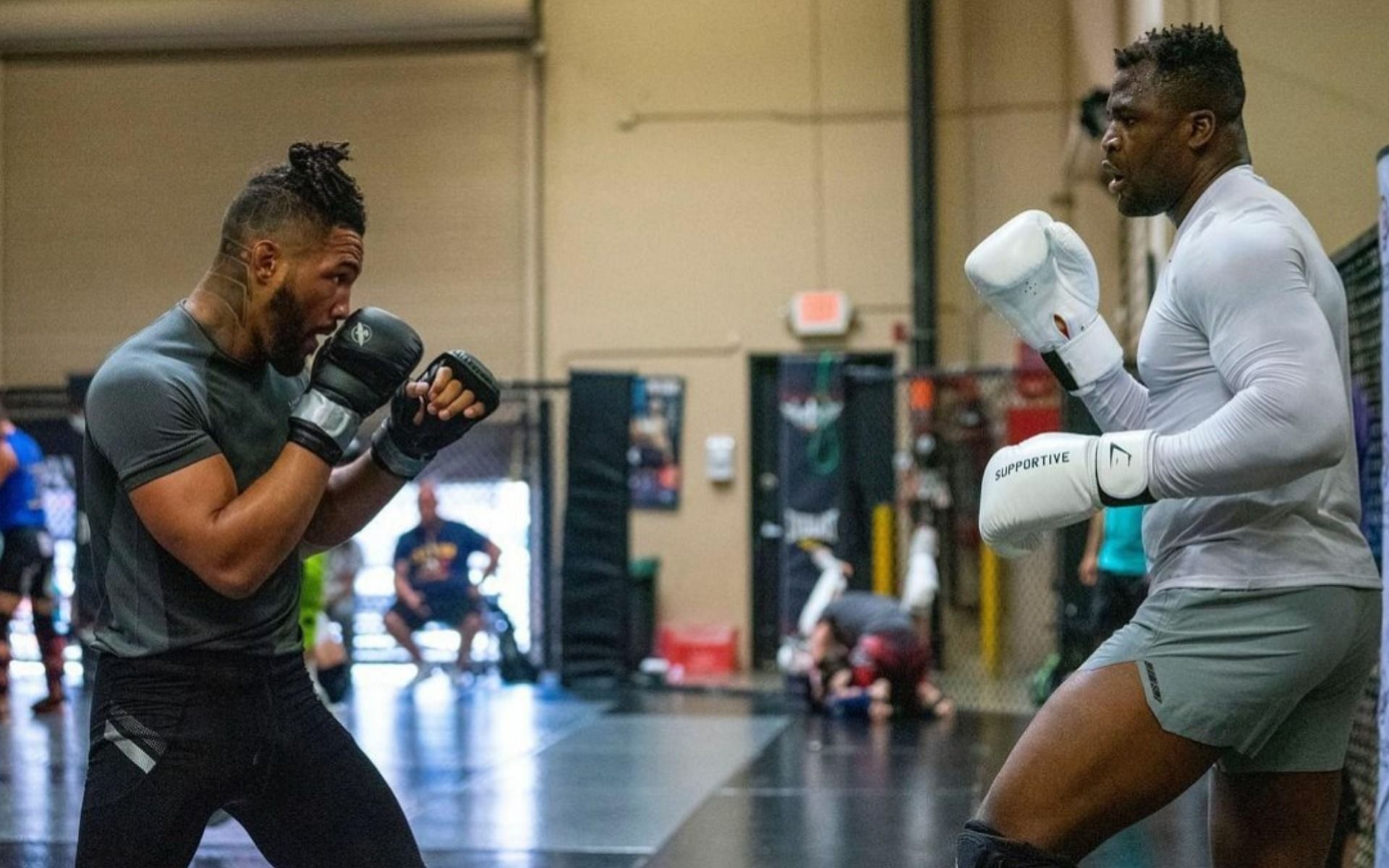 Kevin Lee (left) sparring with Francis Ngannou (right) in Las Vegas, Nevada