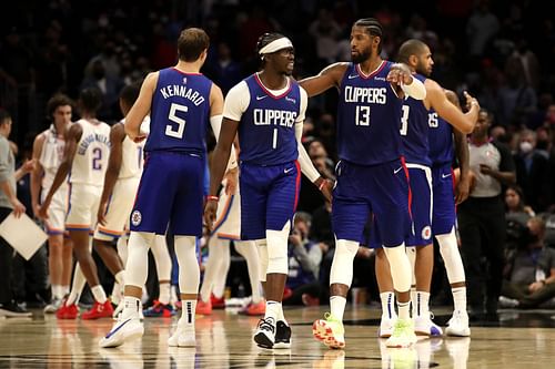 Paul George (13) and Reggie Jackson (1) of the LA Clippers react to a play against the OKC Thunder on Nov. 1, 2021 in Los Angeles, California.