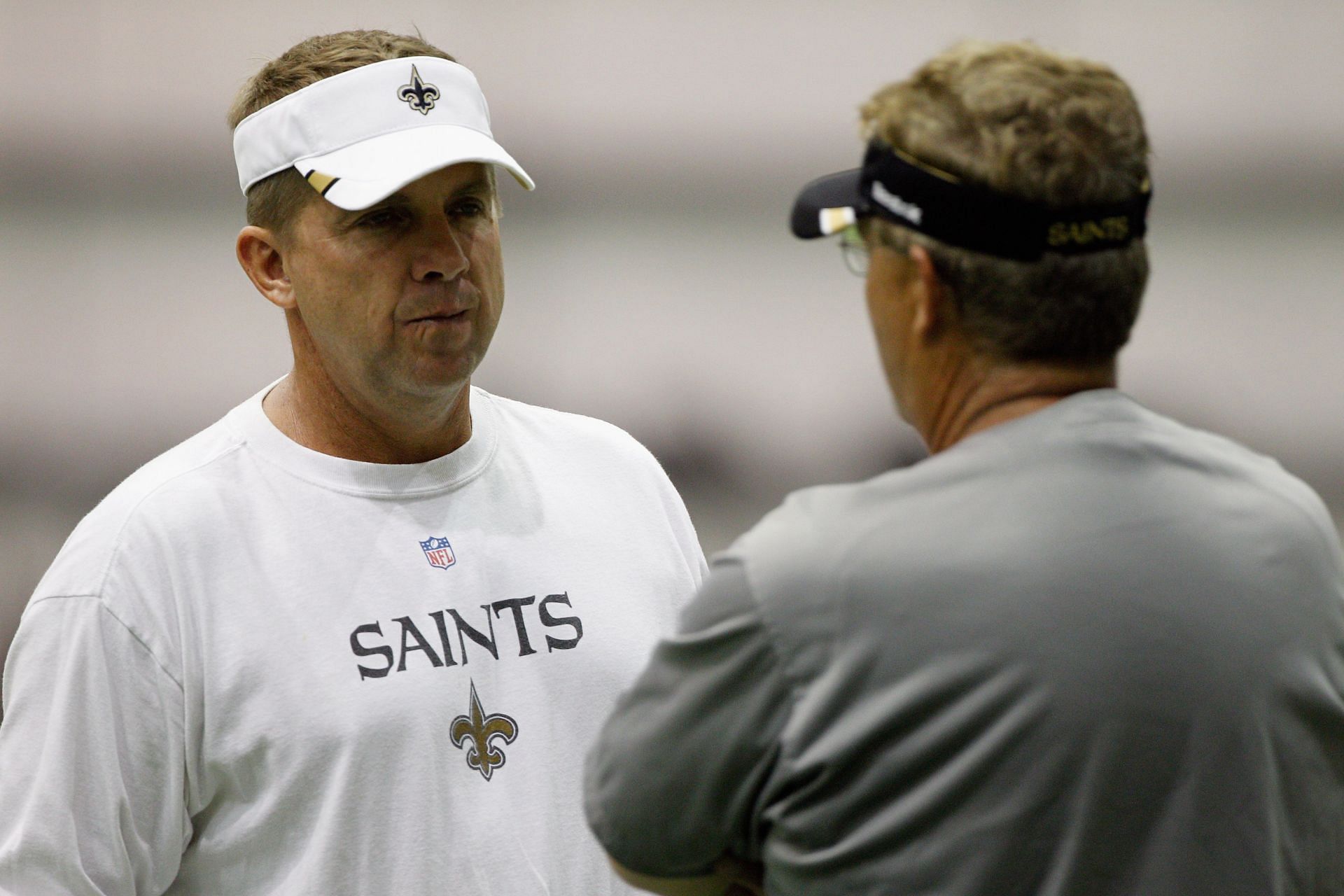 Payton, seen talking to Gregg Williams in 2011, was suspended for the entire 2012 season (Photo: Getty)