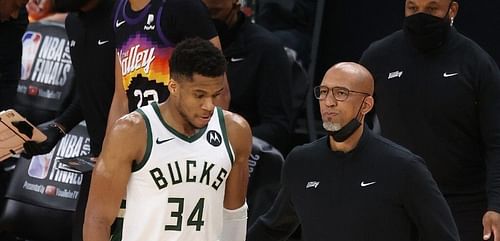 Giannis Antetokounmpo of the Milwaukee Bucks with Phoenix Suns head coach Monty Williams