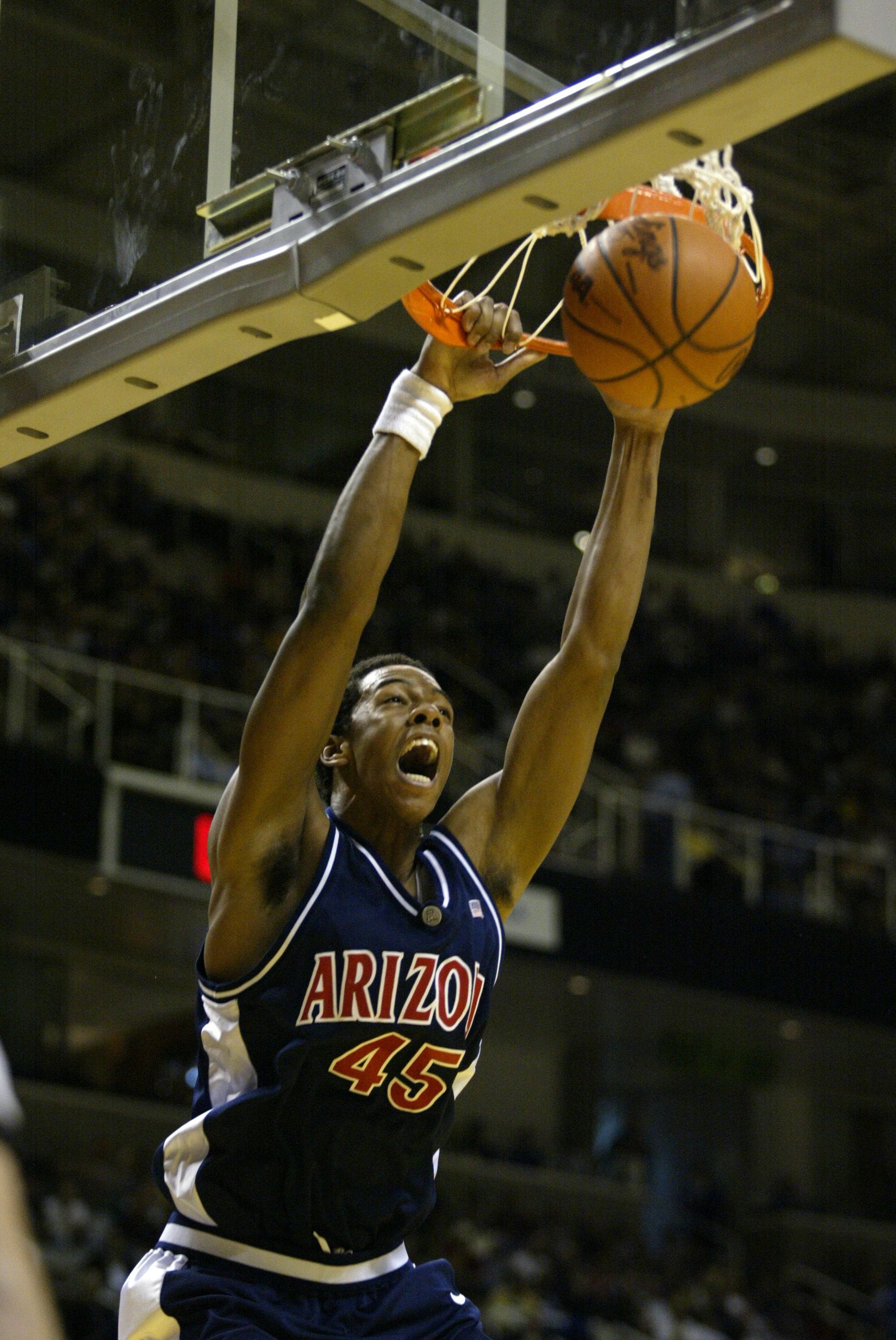 Channing Frye #45 of the Arizona Wildcats slam dunks during the West Regional Semifinal of the 2002 NCAA Basketball Tournament against the Oklahoma Sooners on March 21, 2002 at Compaq Center in San Jose, California. The Sooners won 88-67.