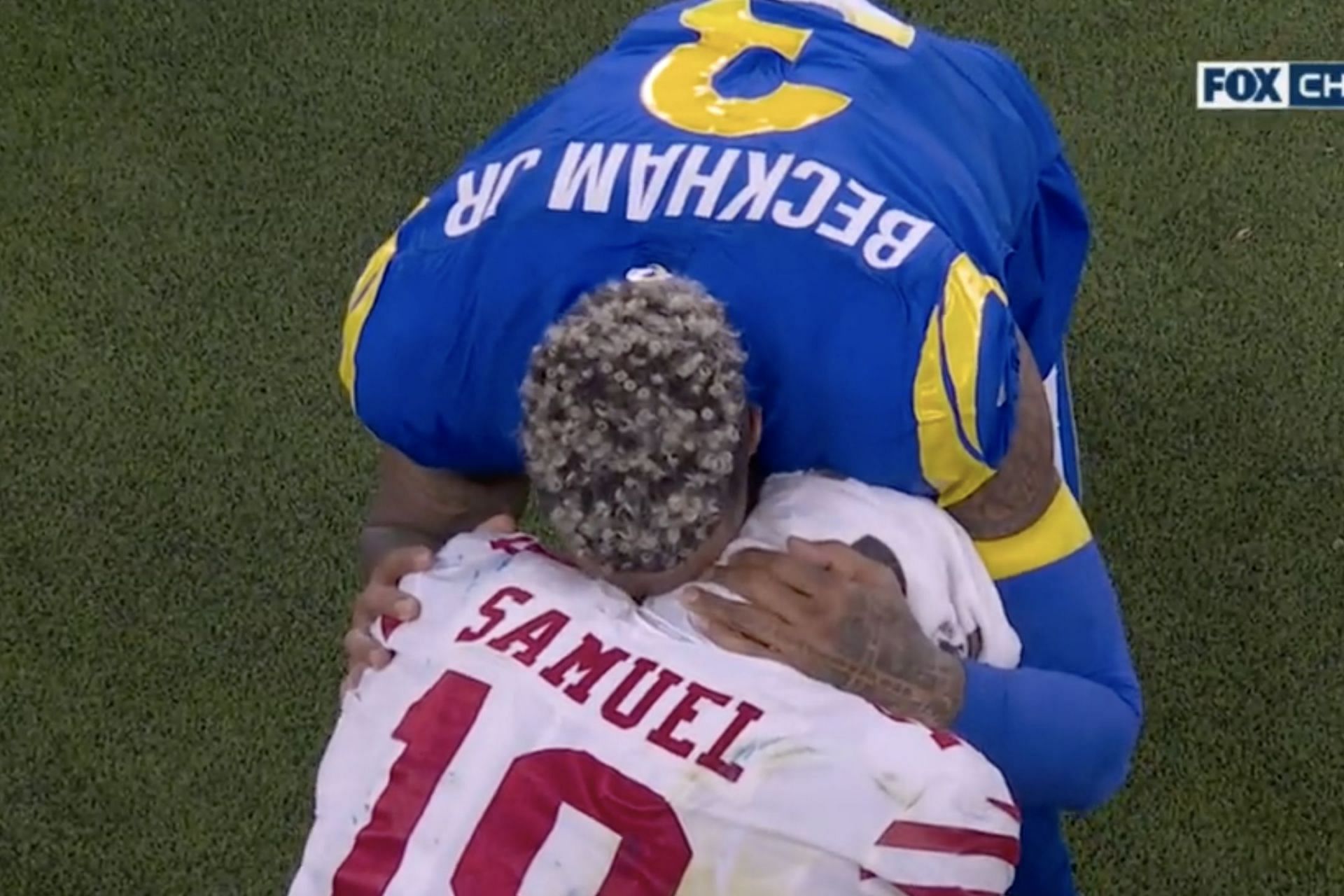 Odell Beckham Jr. consoles Deebo Samuel after the NFC Championship game