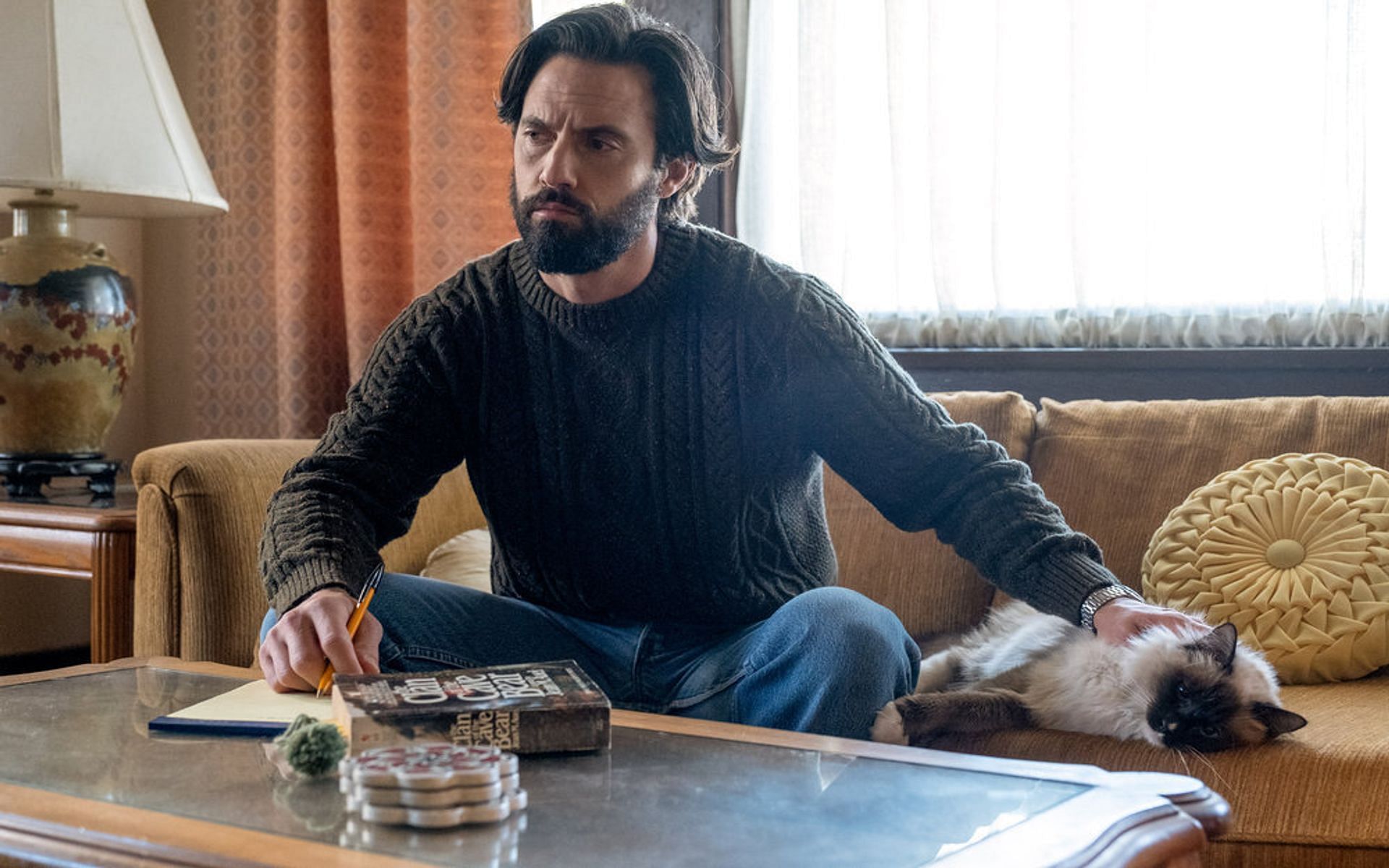 Still from NBC&#039;s This Is Us Season 6 Episode 4 - Jack writing the eulogy (Image via NBC)